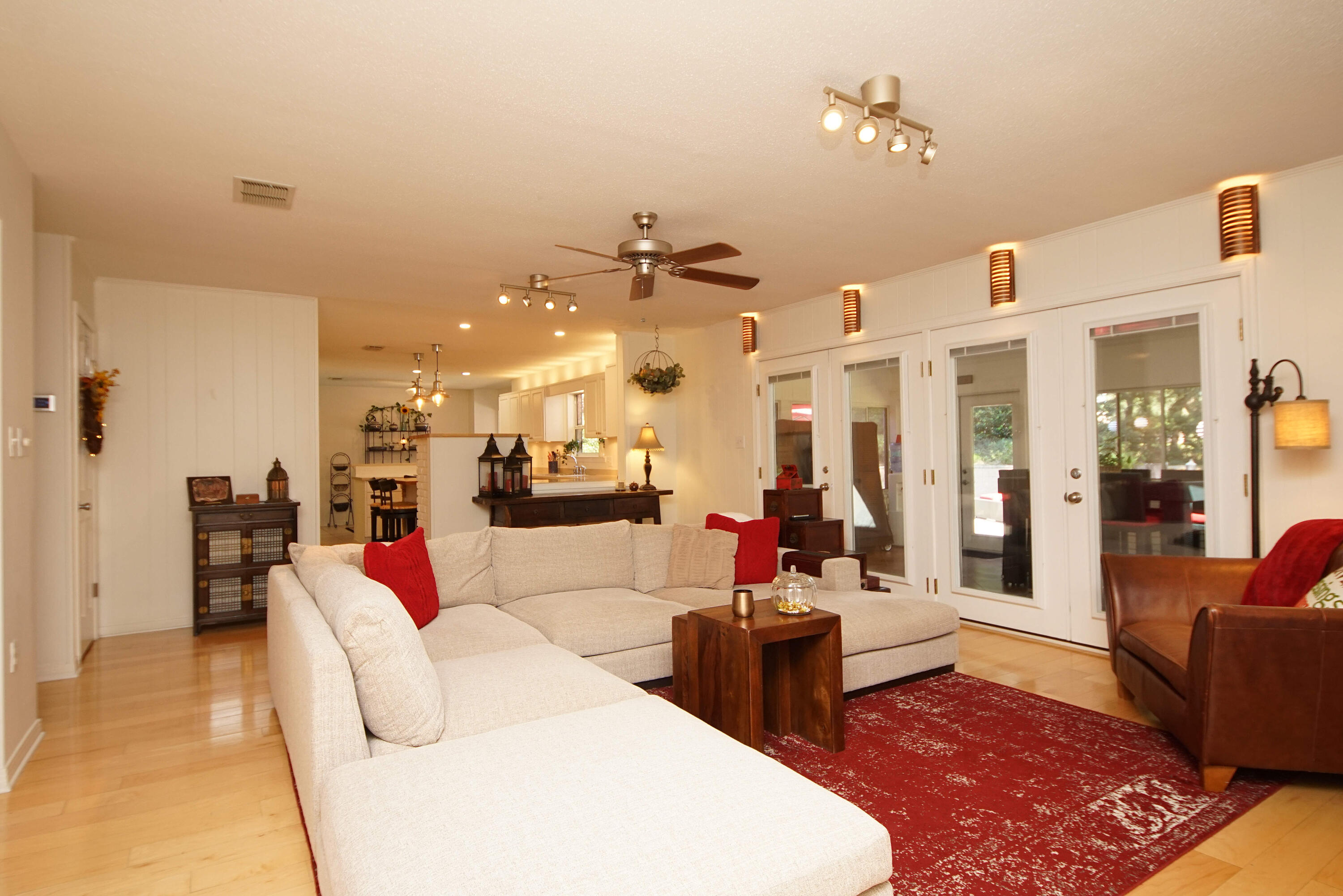 216 Country Club Road Shalimar, FL 32579 - Photo 12 of 59 a living room with furniture and a chandelier