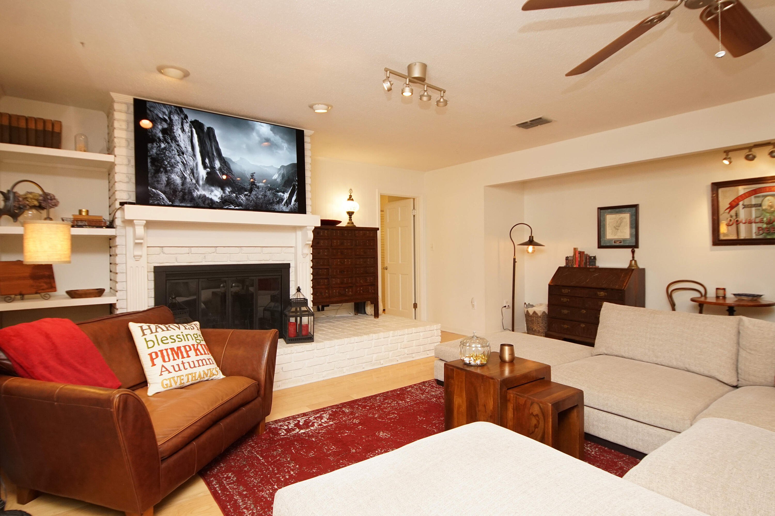 216 Country Club Road Shalimar, FL 32579 - Photo 13 of 59 a living room with furniture and a fireplace