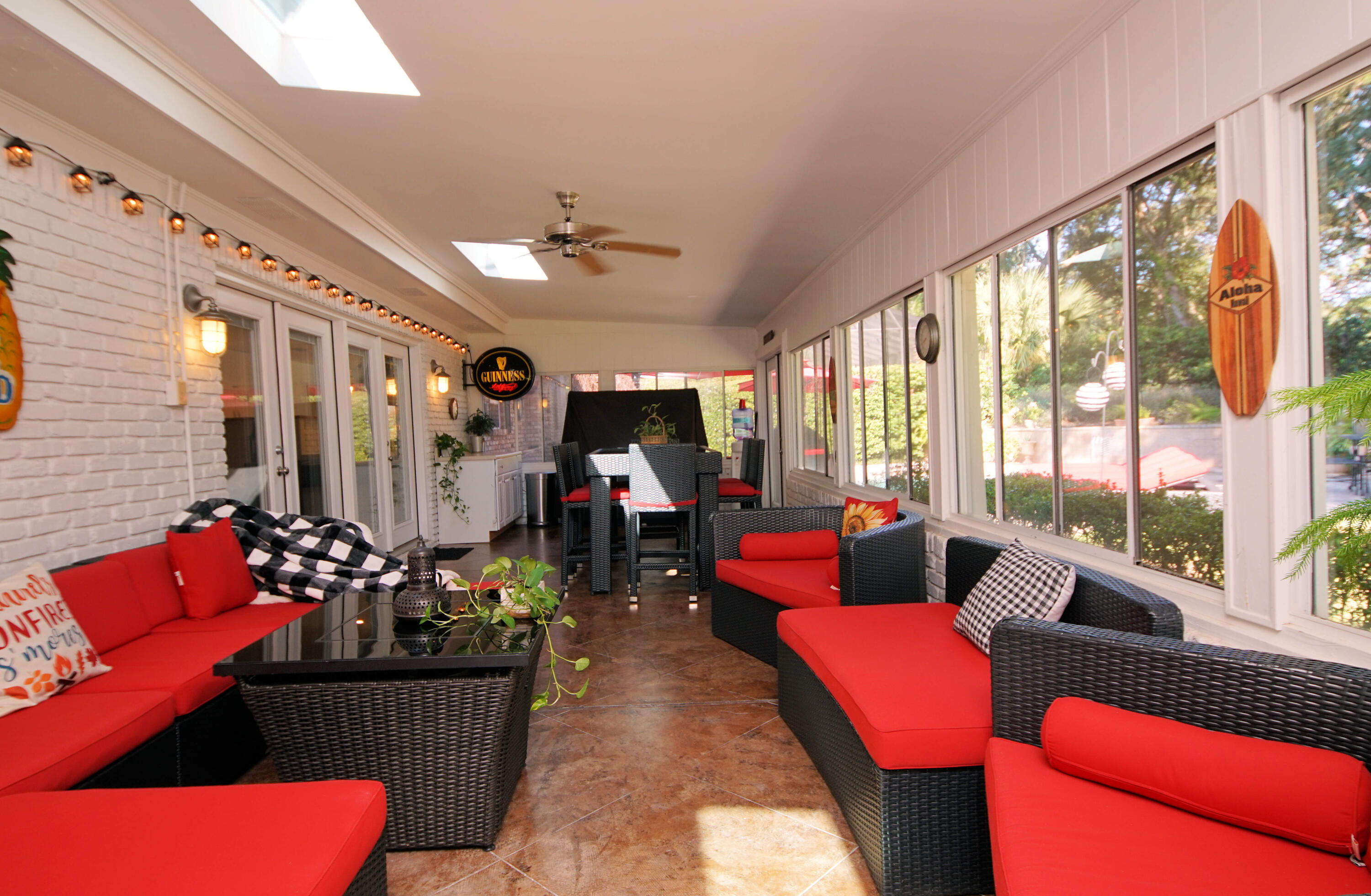 216 Country Club Road Shalimar, FL 32579 - Photo 24 of 59 a living room filled with furniture and a floor to ceiling window