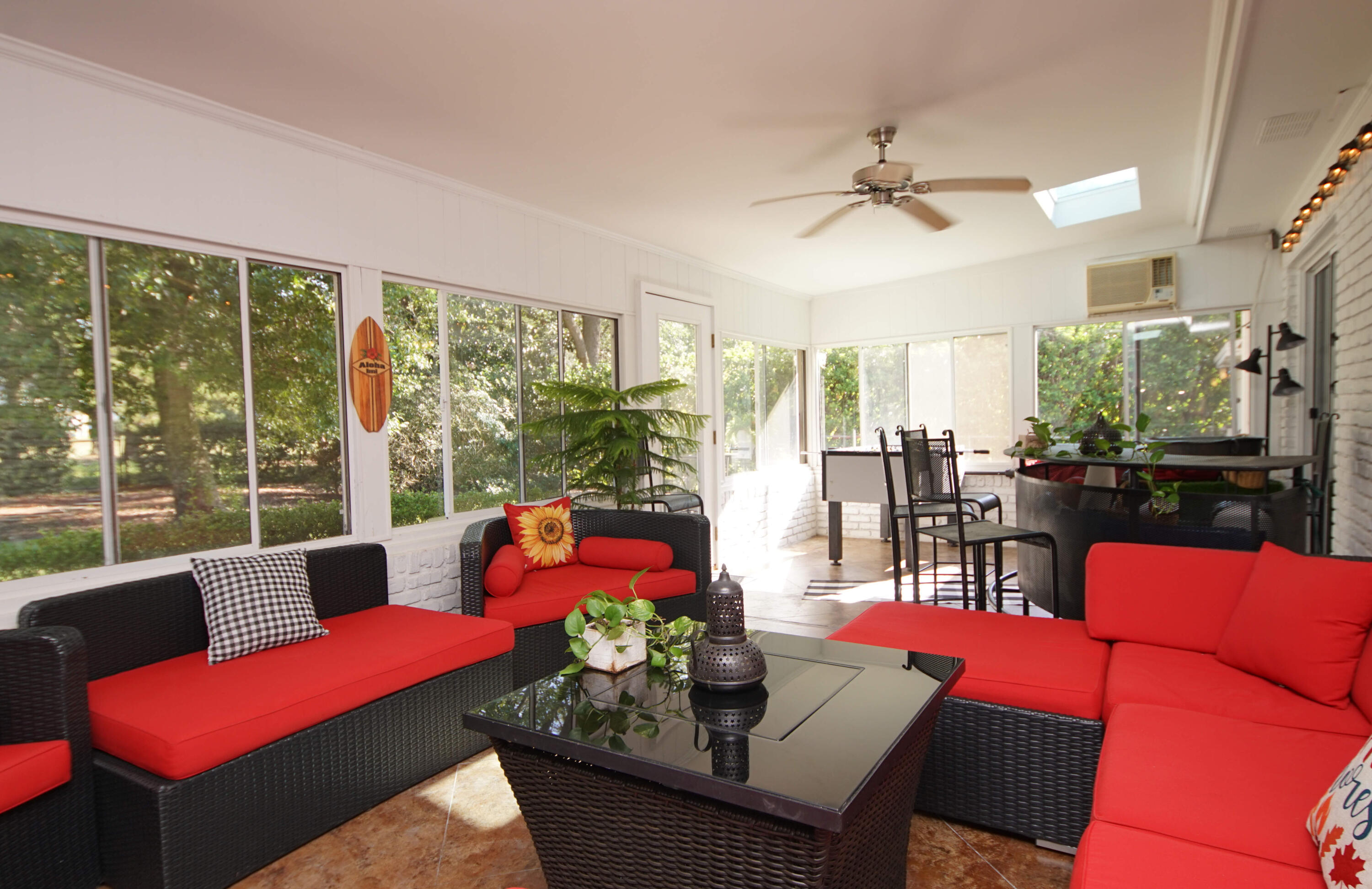 216 Country Club Road Shalimar, FL 32579 - Photo 25 of 59 a living room with furniture a large window and a dining table