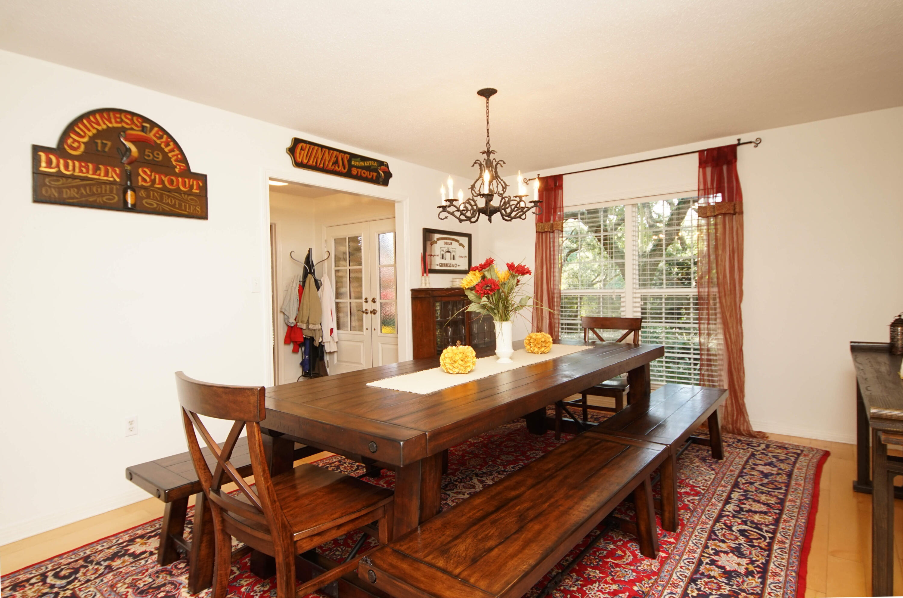 216 Country Club Road Shalimar, FL 32579 - Photo 28 of 59 a view of a dining room with furniture window and wooden floor