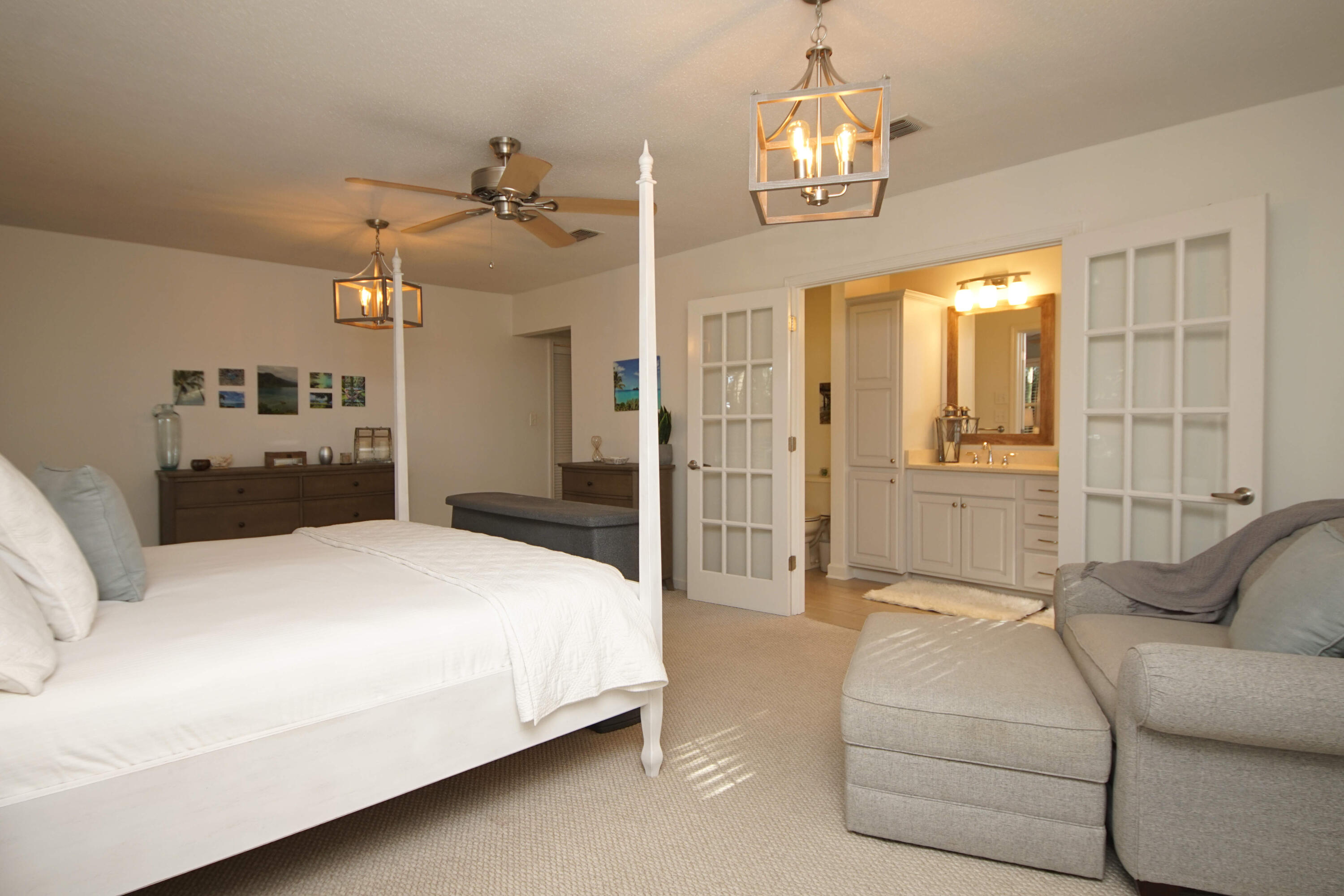 216 Country Club Road Shalimar, FL 32579 - Photo 33 of 59 a spacious bedroom with a bed couch and window