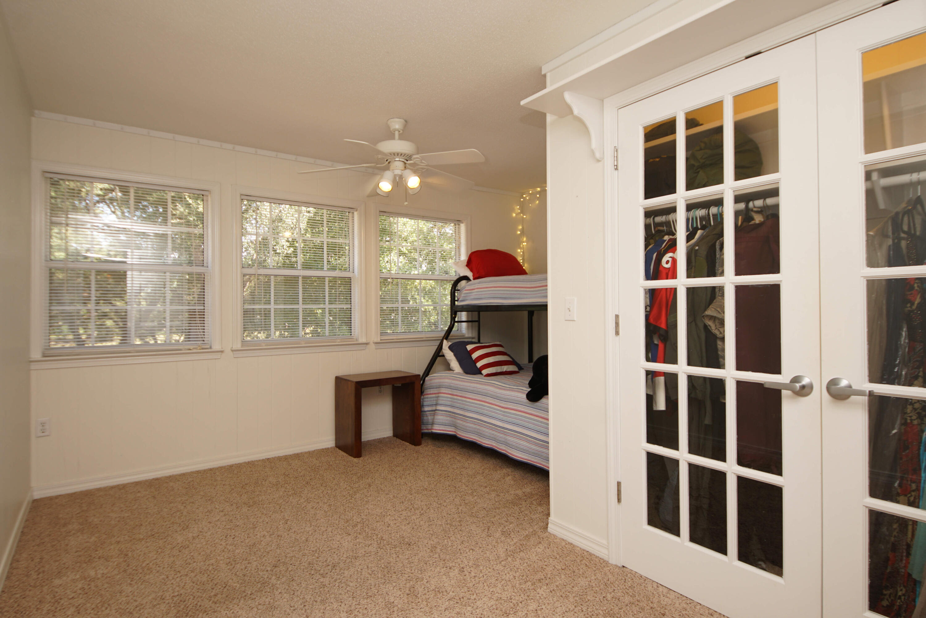 216 Country Club Road Shalimar, FL 32579 - Photo 48 of 59 a bedroom with furniture and windows