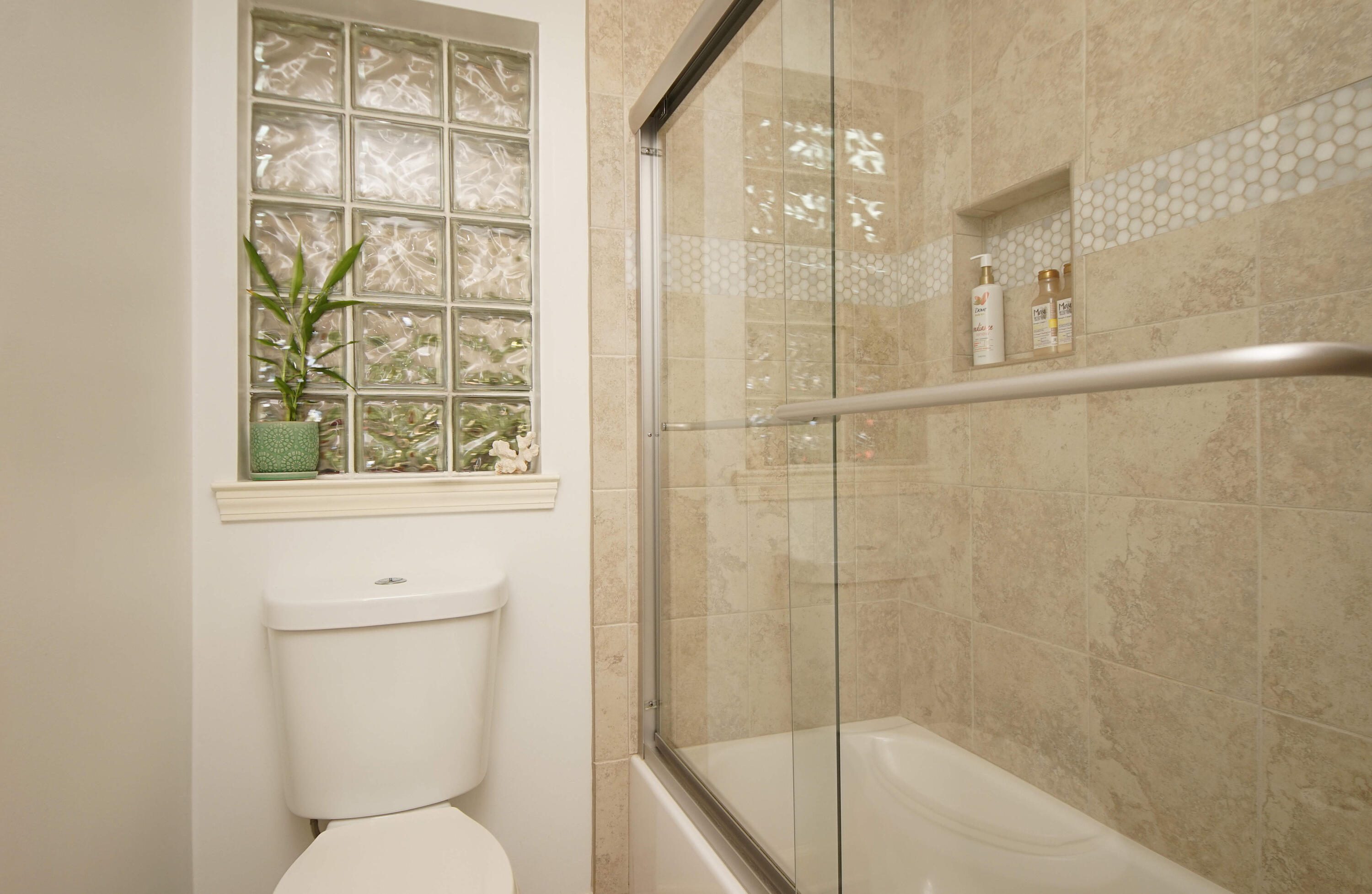 216 Country Club Road Shalimar, FL 32579 - Photo 50 of 59 a bathroom with a shower and toilet