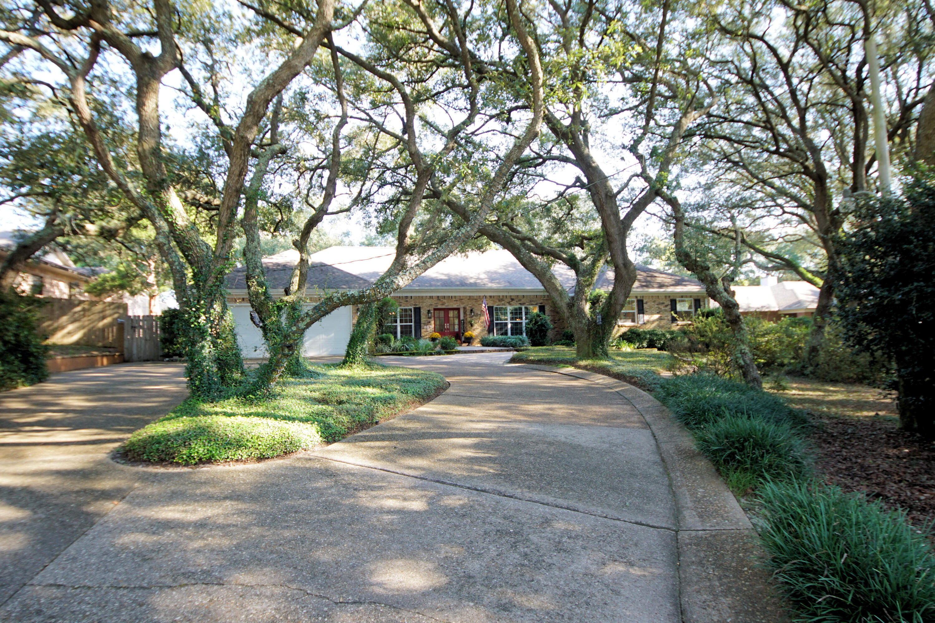 216 Country Club Road Shalimar, FL 32579 - Photo 59 of 59 a view of a park with tree s