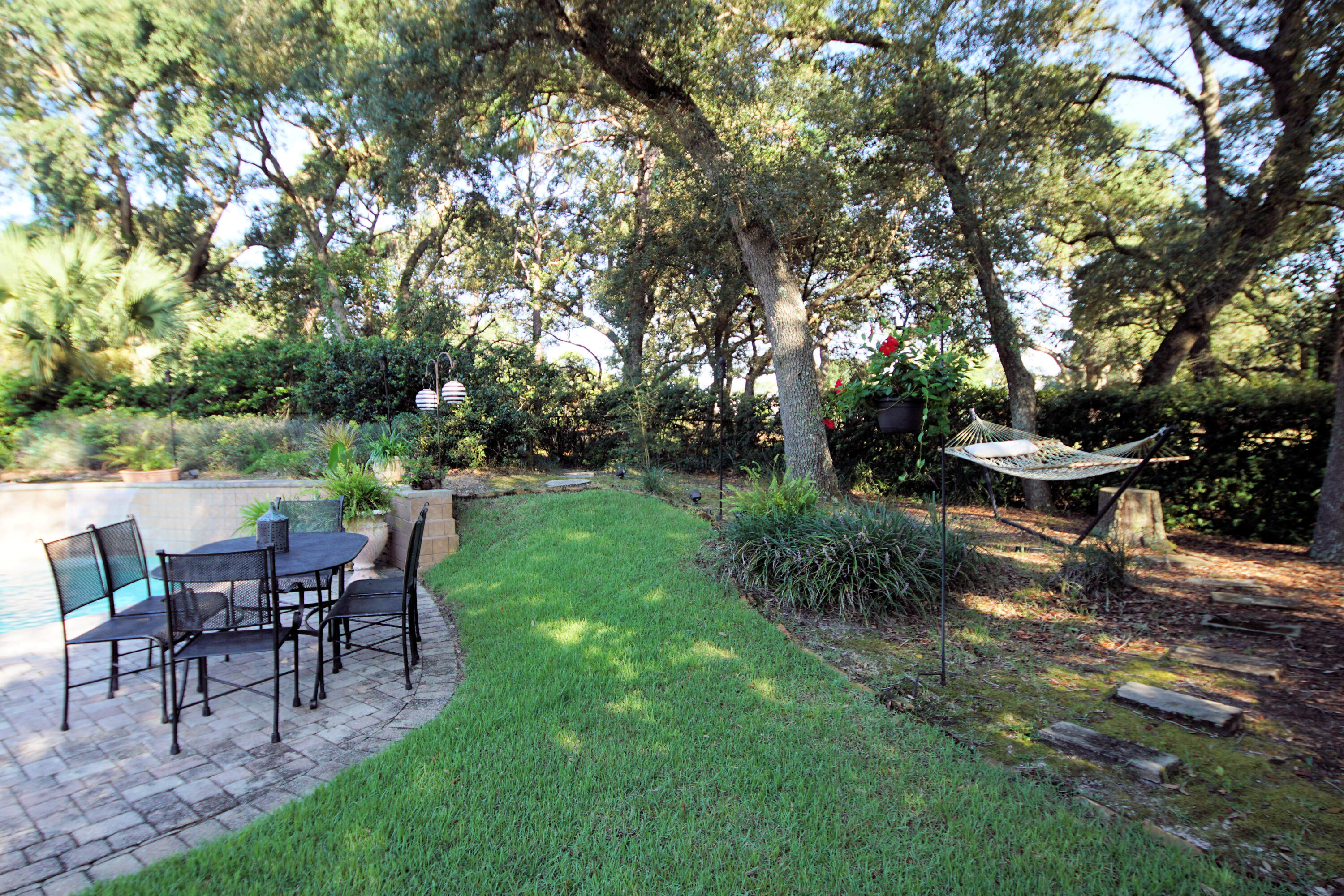 216 Country Club Road Shalimar, FL 32579 - Photo 9 of 59 a view of a house with backyard and sitting area