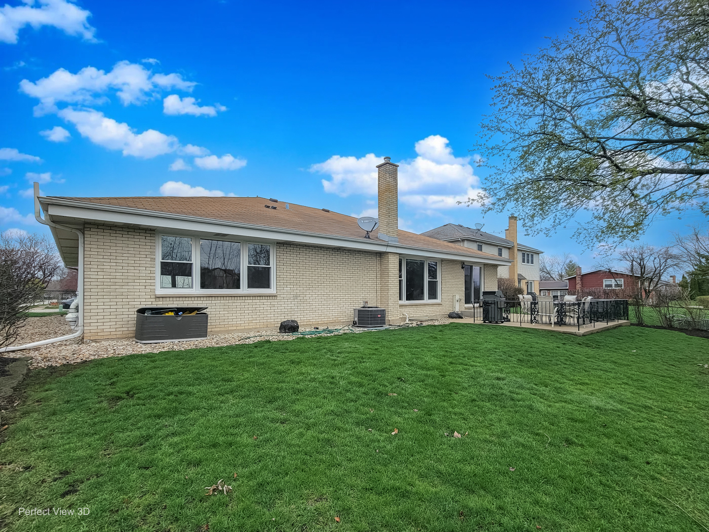 1003 West Hintz Road Arlington Heights, IL 60004 - Photo 24 of 27 a front view of a house with garden