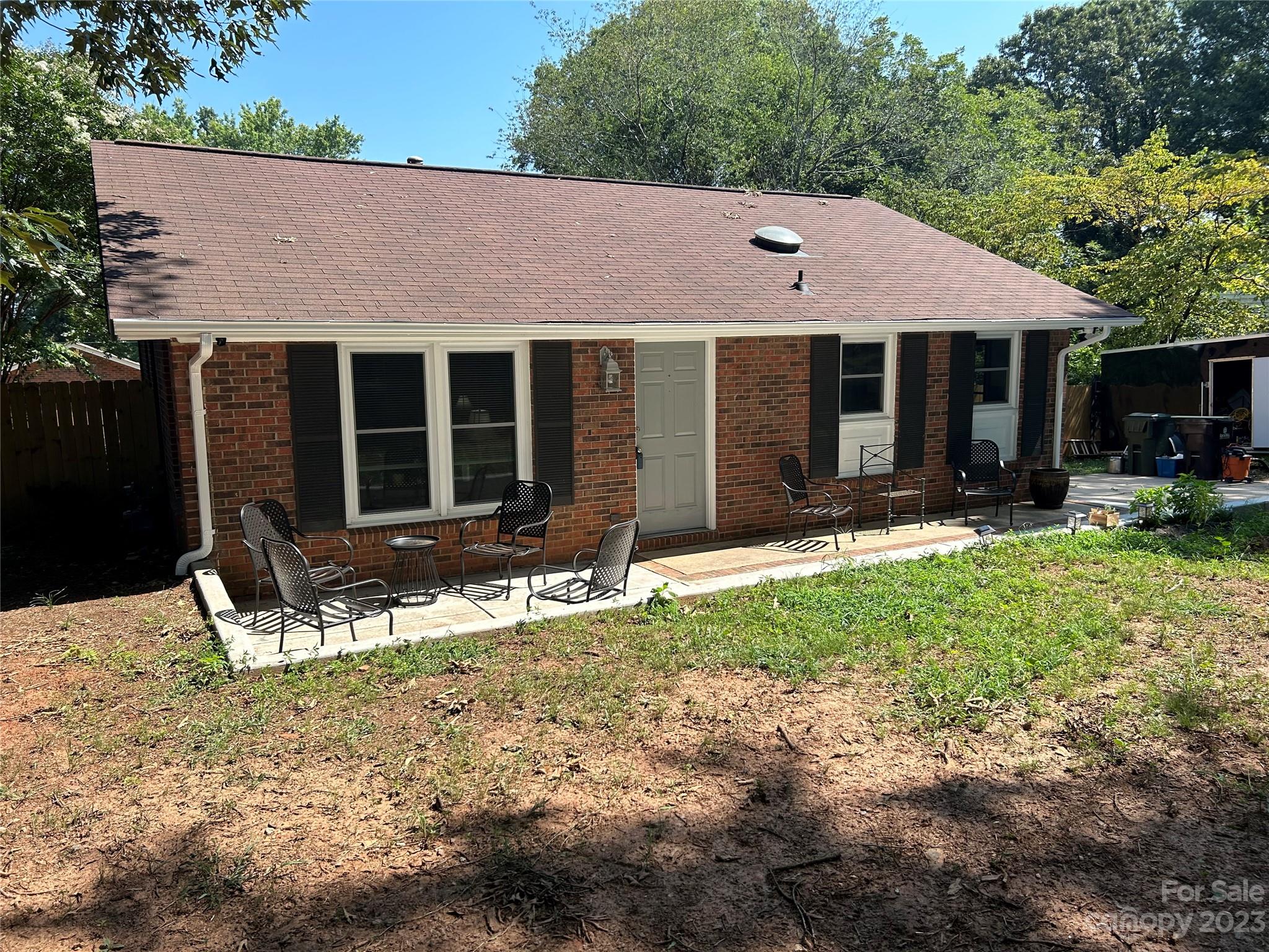 1109 Pinewood Road Rock Hill, SC 29730 - Photo 1 of 26 a front view of a house with yard patio and fire pit