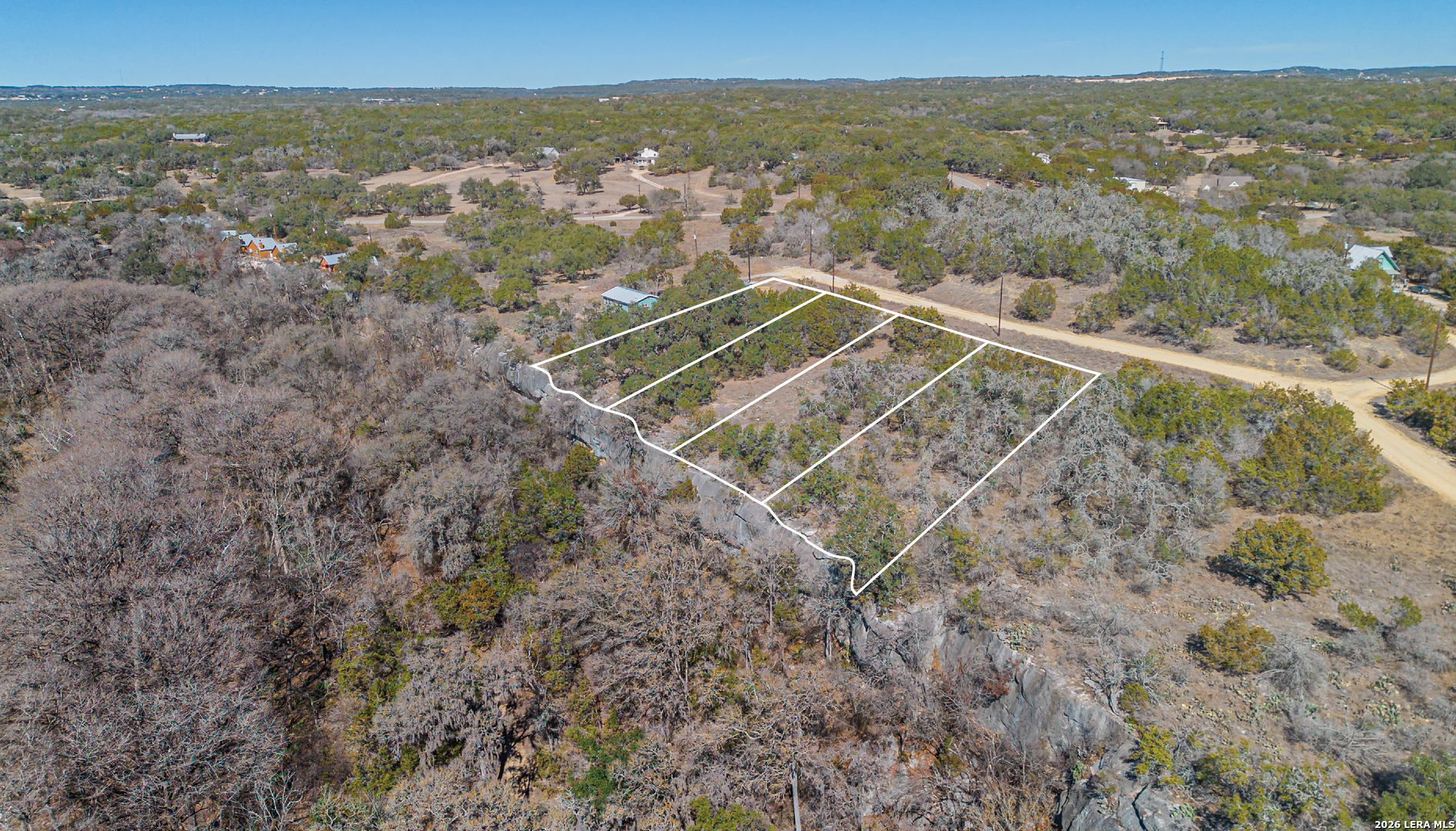 1076 Blue Bonnet Hl Drive Spring Branch, TX 78070 - Photo 19 of 44 a view of a sky from a city