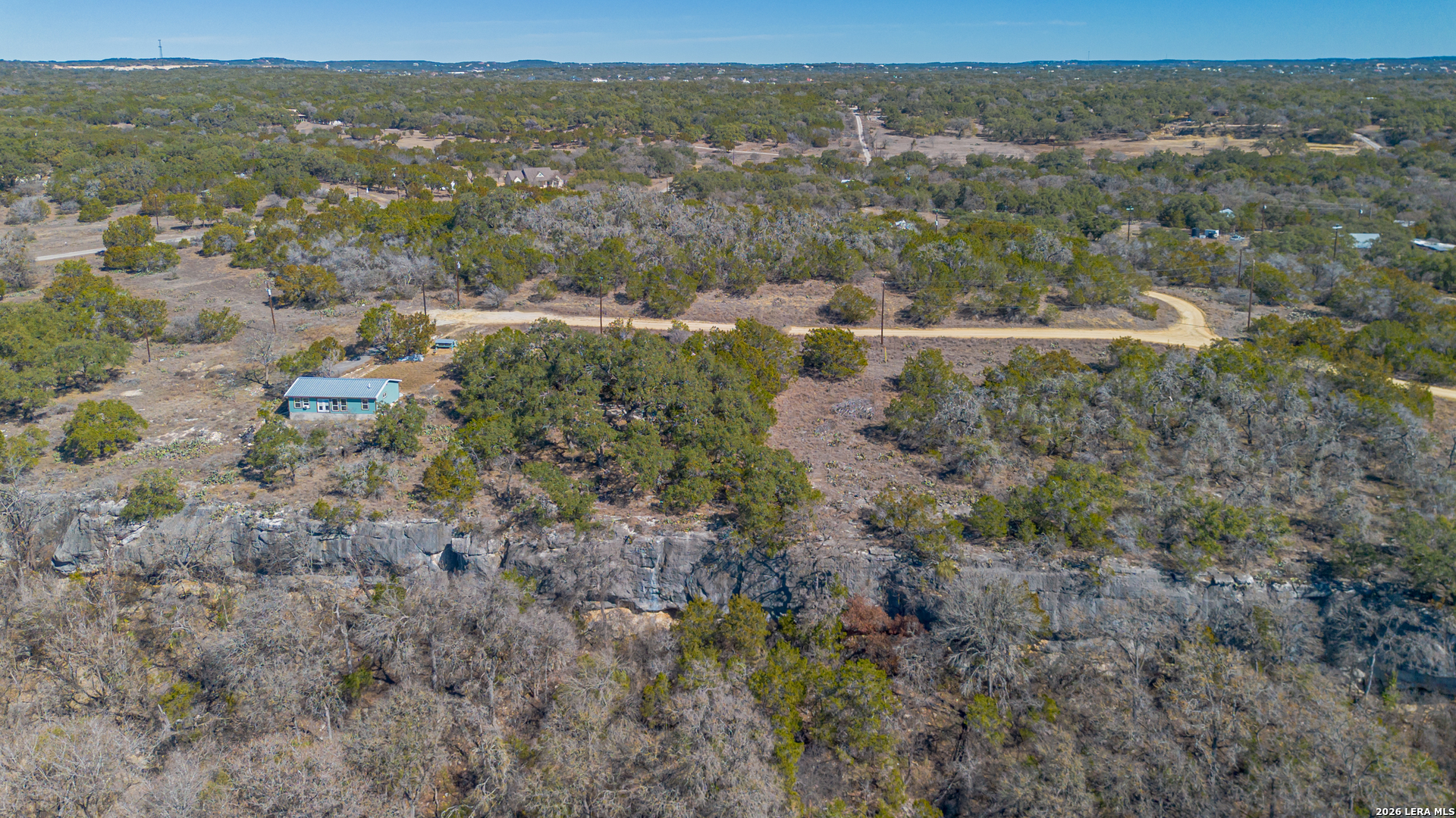 1076 Blue Bonnet Hl Drive Spring Branch, TX 78070 - Photo 24 of 44 a view of a city with mountain view