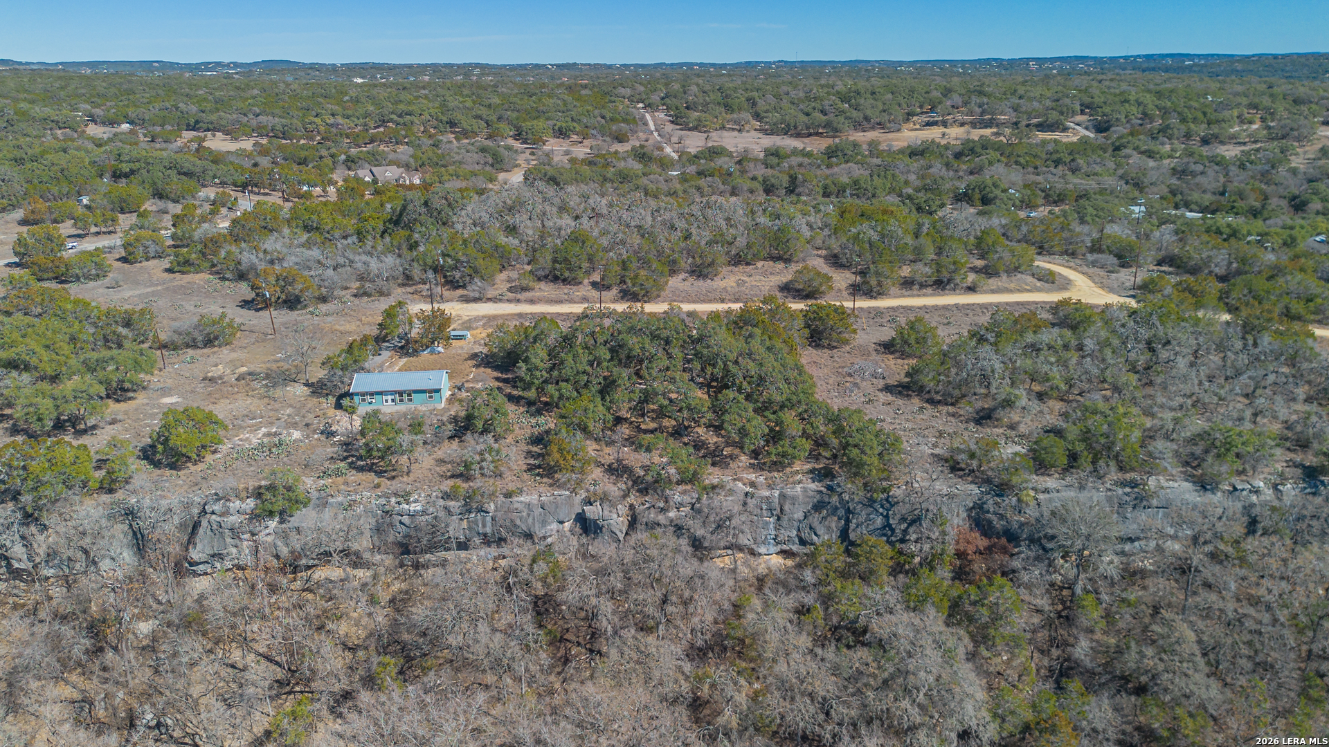 1076 Blue Bonnet Hl Drive Spring Branch, TX 78070 - Photo 25 of 44 an aerial view of residential house and space