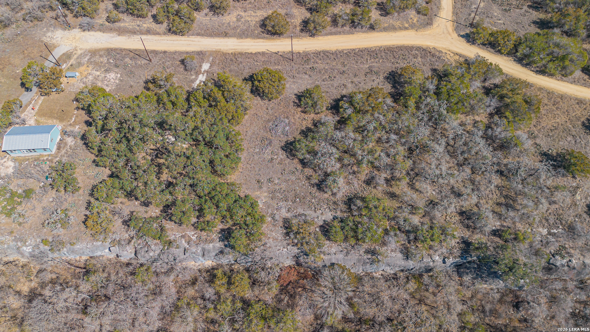 1076 Blue Bonnet Hl Drive Spring Branch, TX 78070 - Photo 30 of 44 a view of a yard with a yard