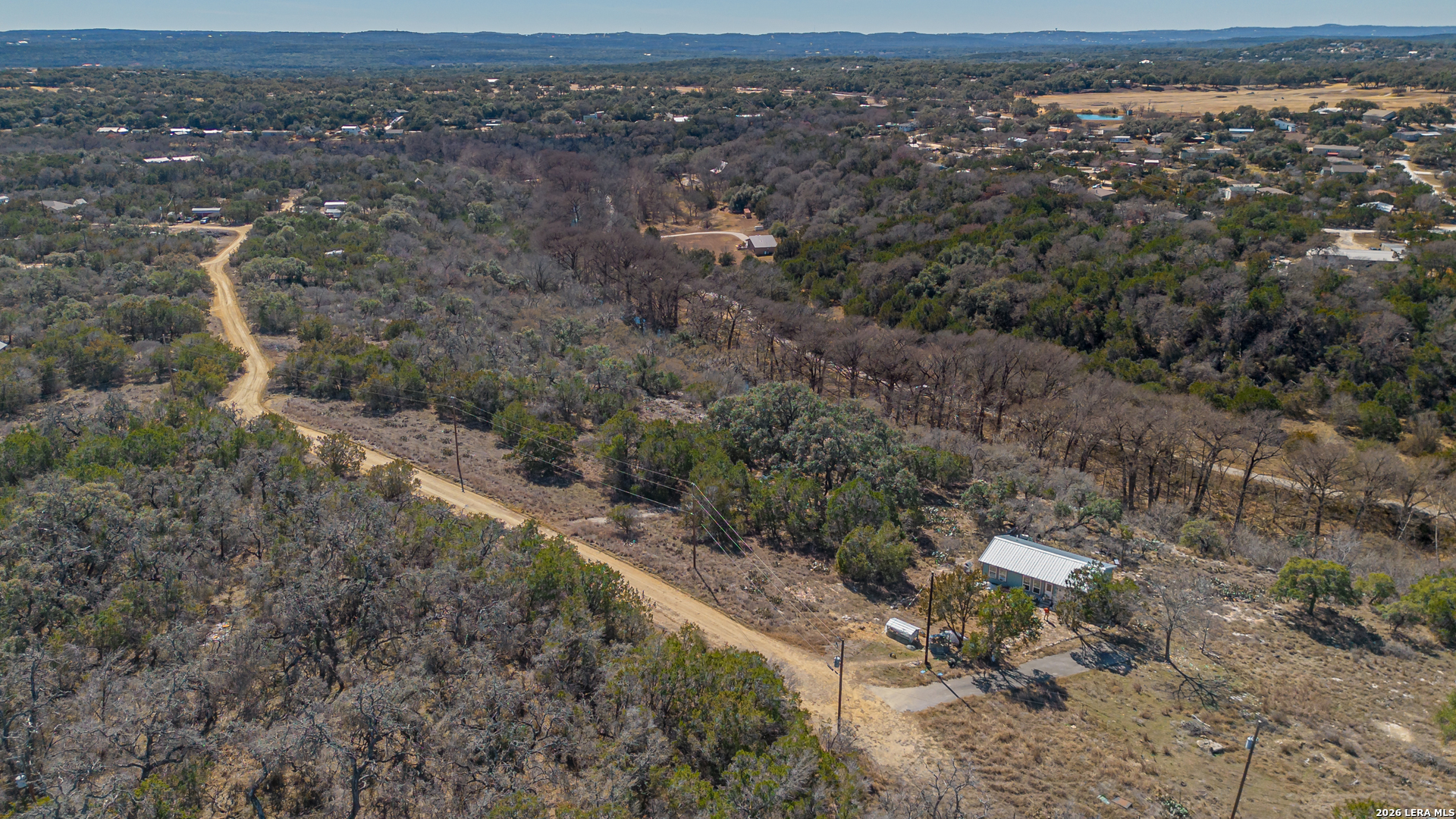 1076 Blue Bonnet Hl Drive Spring Branch, TX 78070 - Photo 39 of 44 an aerial view of multiple house