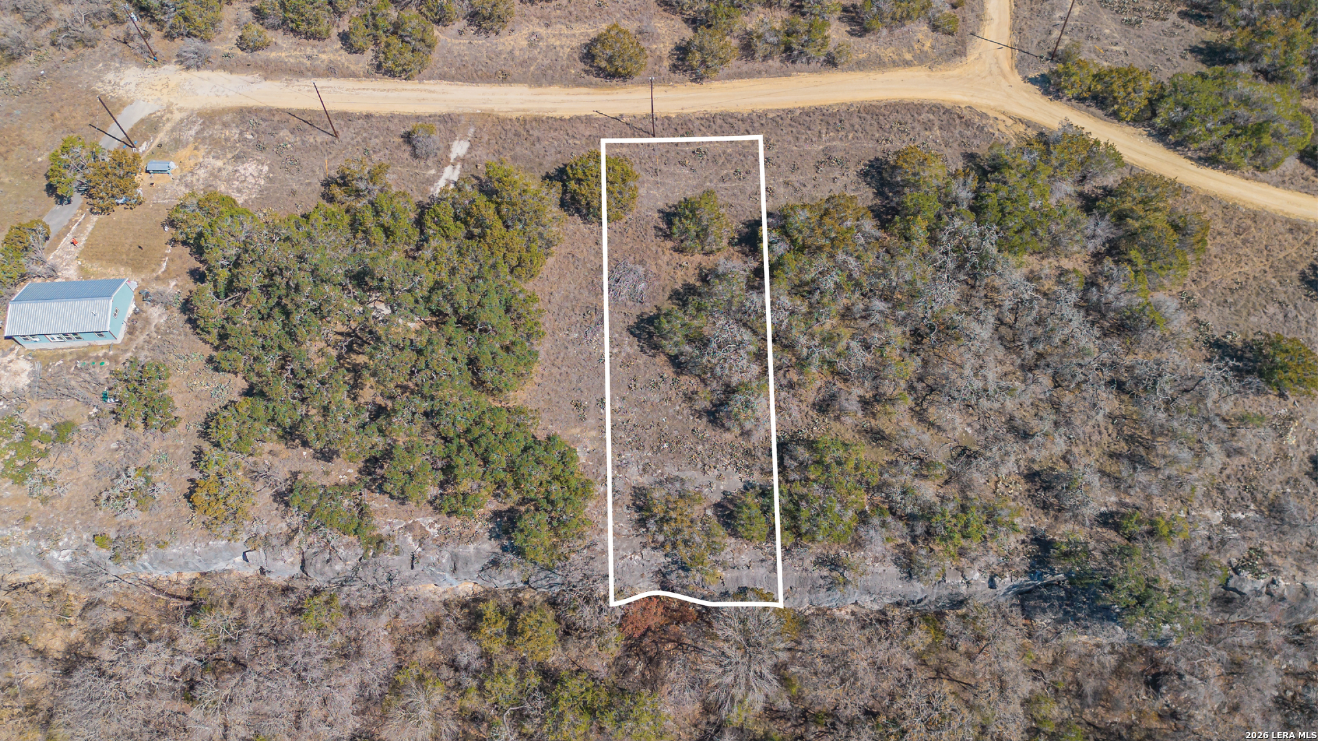 1076 Blue Bonnet Hl Drive Spring Branch, TX 78070 - Photo 4 of 44 a view of a backyard