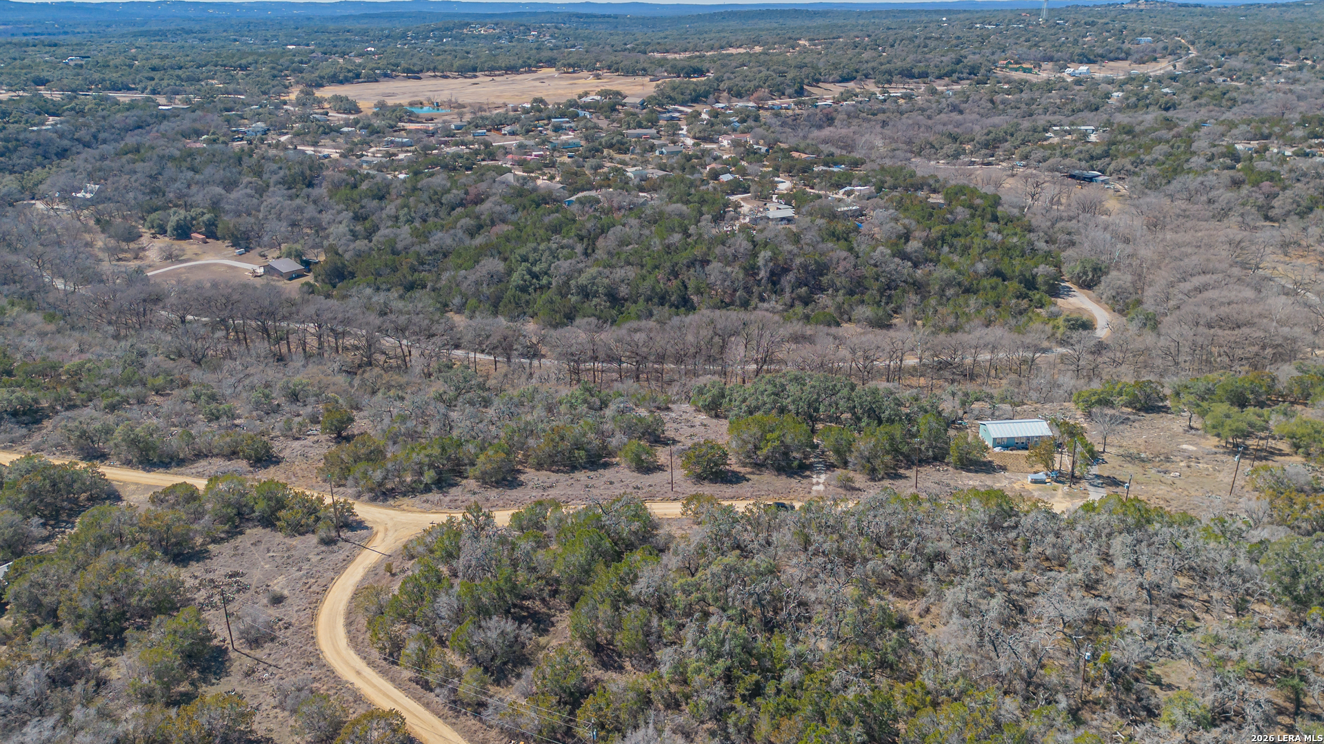 1076 Blue Bonnet Hl Drive Spring Branch, TX 78070 - Photo 41 of 44 an aerial view of house with yard