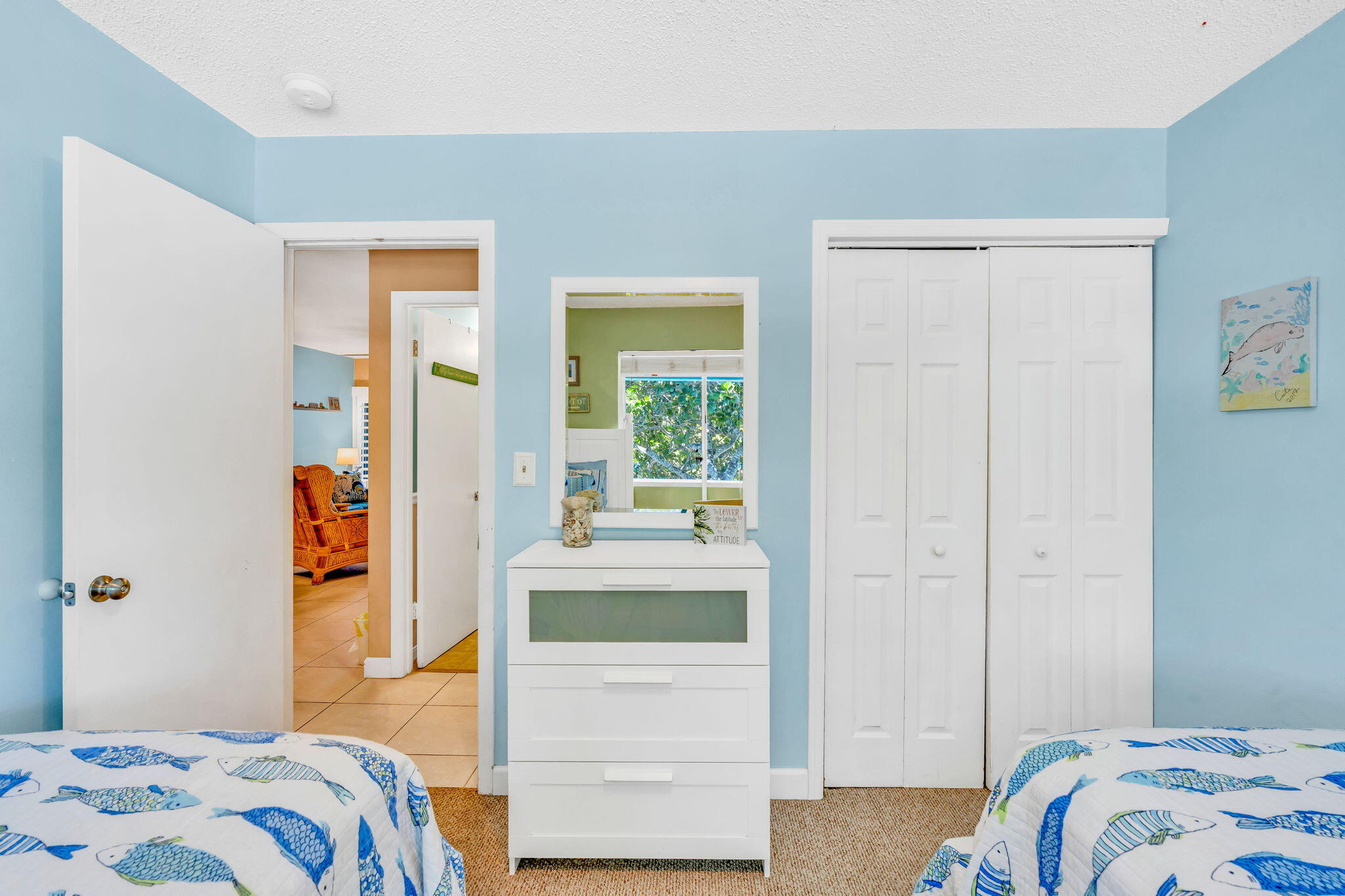 98422 Windward Avenue Key Largo, FL 33037 - Photo 19 of 44 a bedroom with a bed and a window