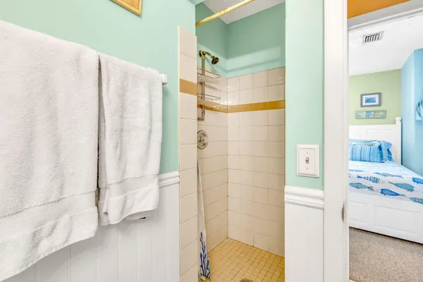 a view of balcony with wooden floor