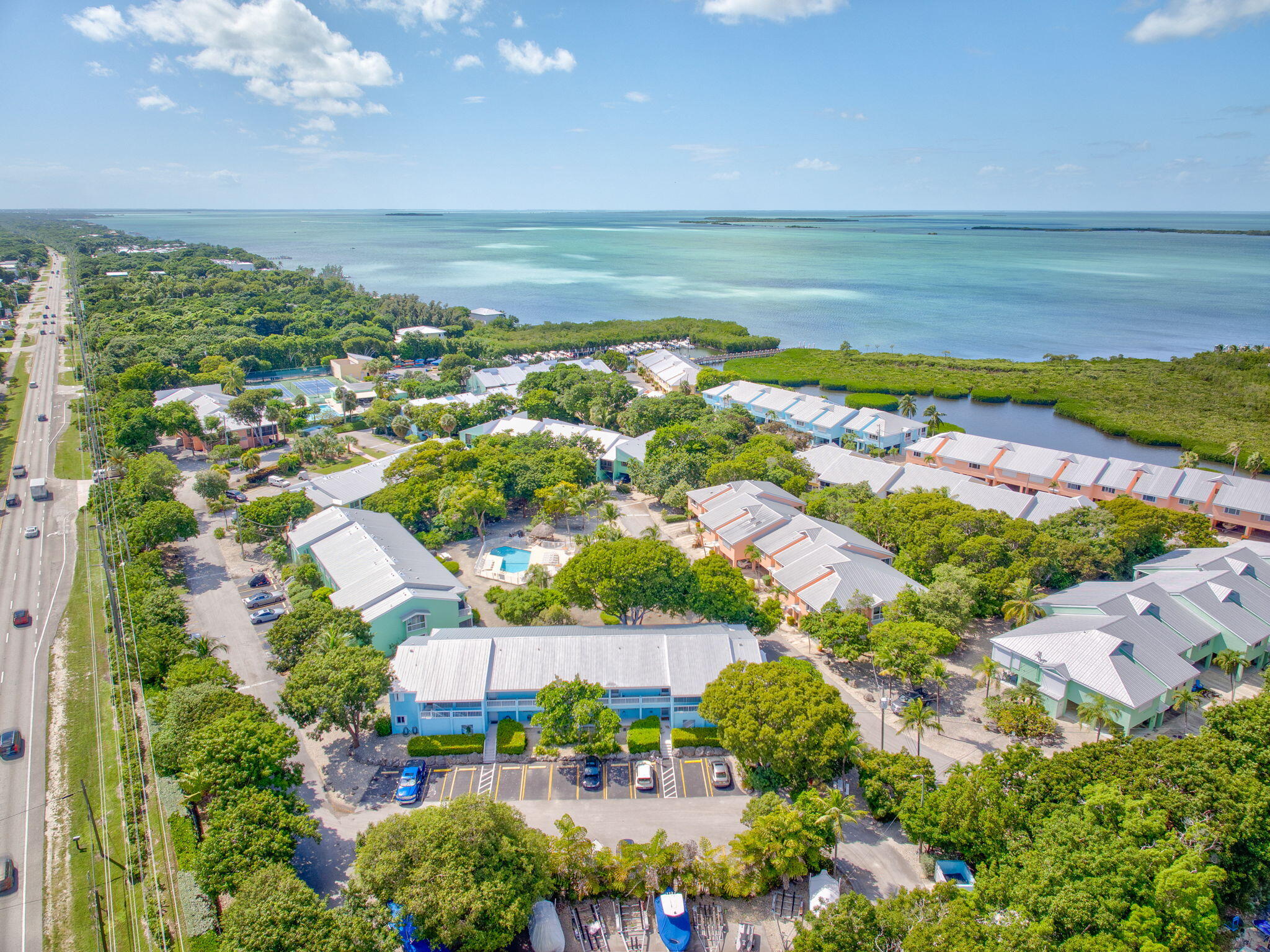 98422 Windward Avenue Key Largo, FL 33037 - Photo 28 of 44 a view of a city with an ocean