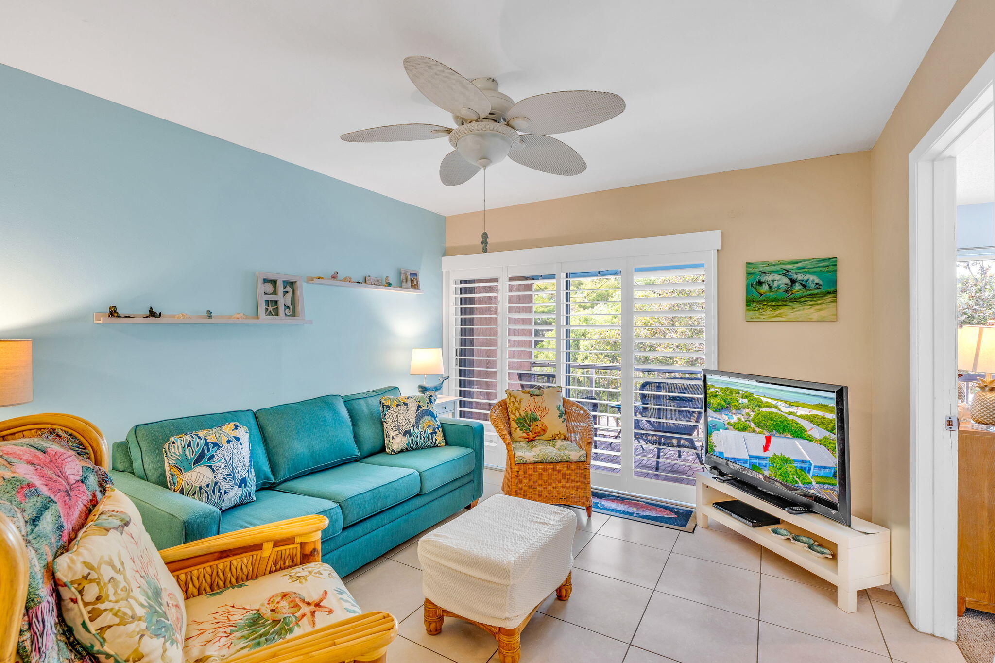 98422 Windward Avenue Key Largo, FL 33037 - Photo 7 of 44 a living room with furniture and a flat screen tv