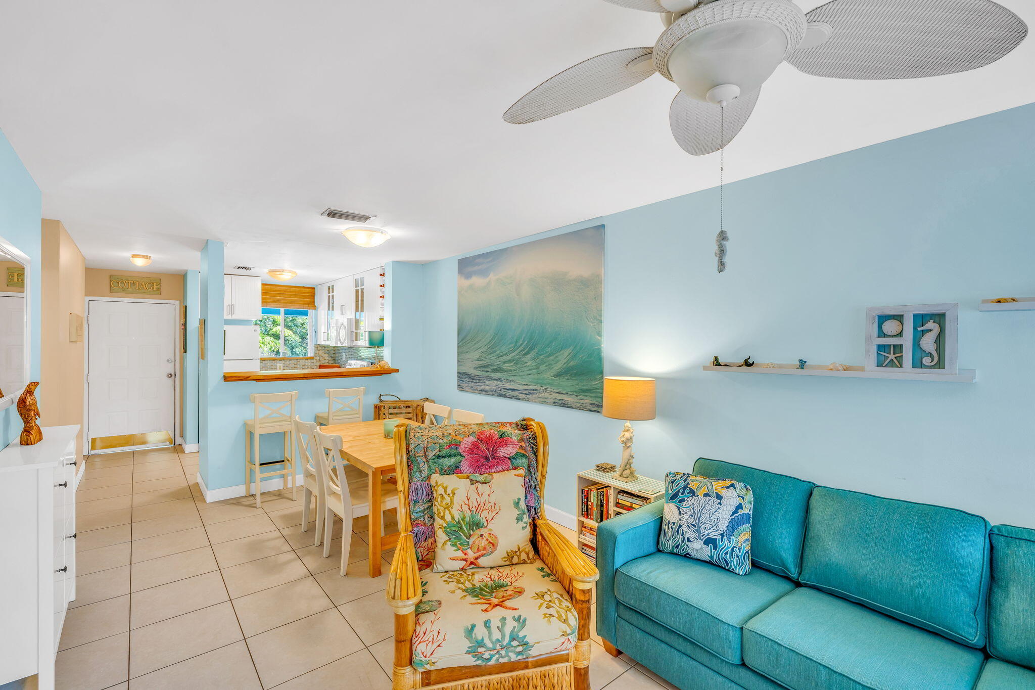 98422 Windward Avenue Key Largo, FL 33037 - Photo 8 of 44 a living room with furniture and a chandelier
