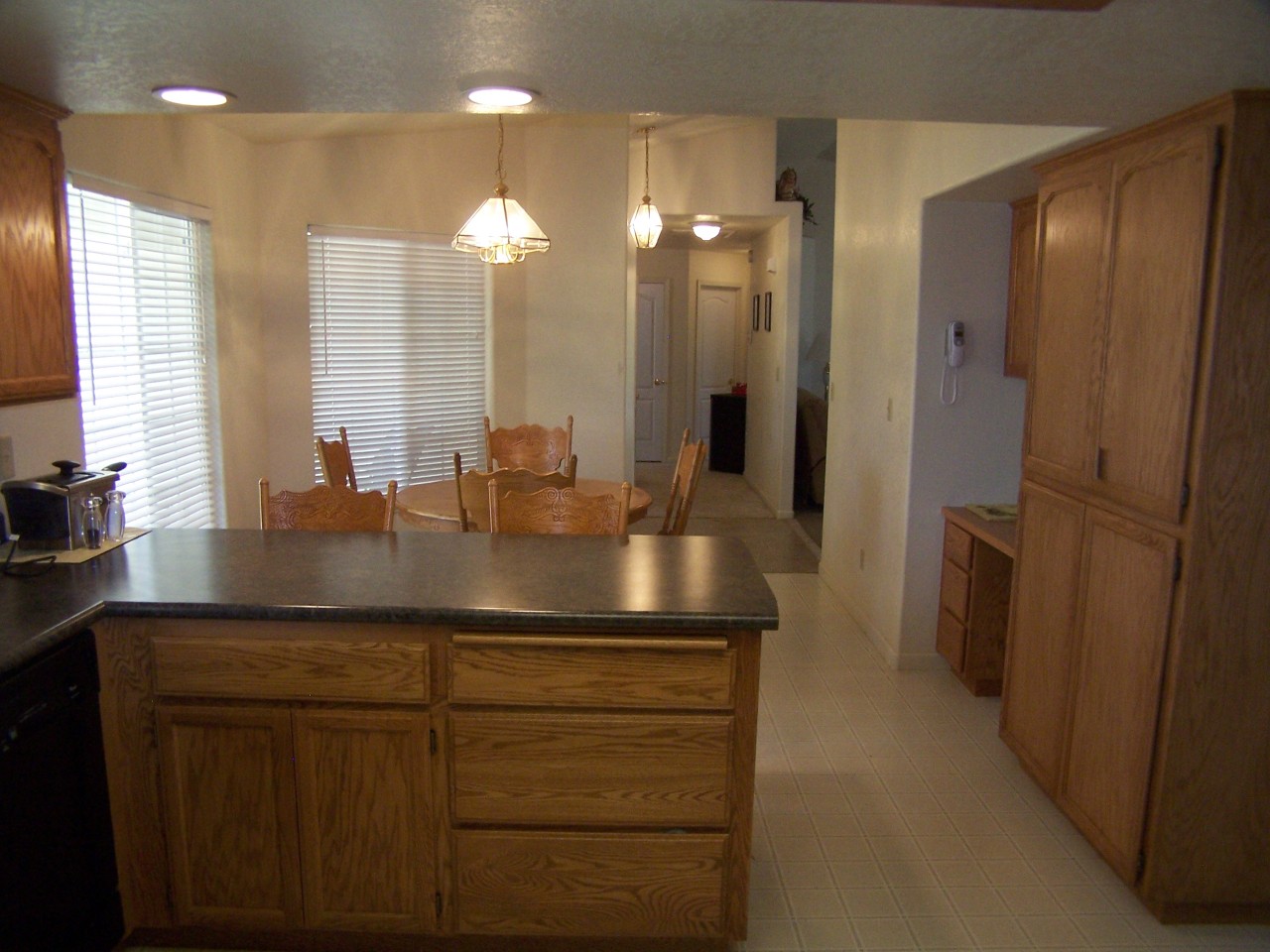 16144 Zandell Road Anderson, CA 96007 - Photo 4 of 24 Nook and breakfast bar from kitchen