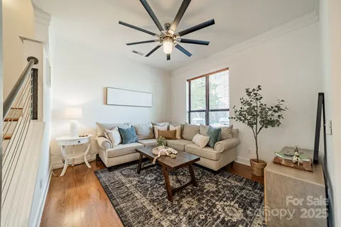 a living room with furniture or couch and a window