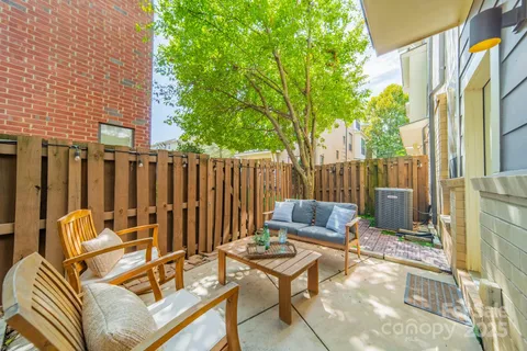 a view of a chairs in the patio
