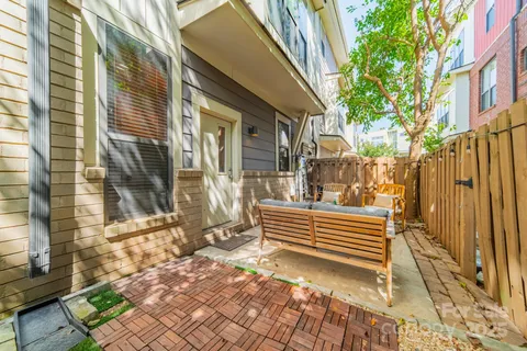 a view of outdoor space with deck and furniture