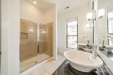 a bathroom with a bathtub and a sink