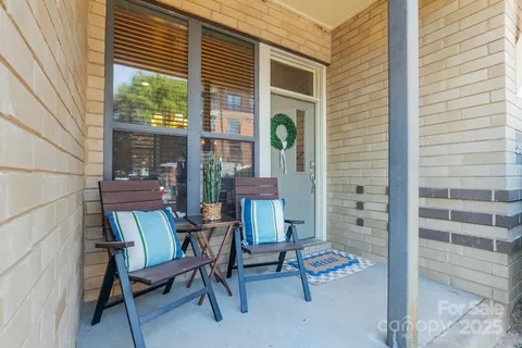 a building outdoor space with patio furniture