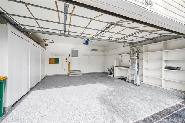 a view of empty room with white walls