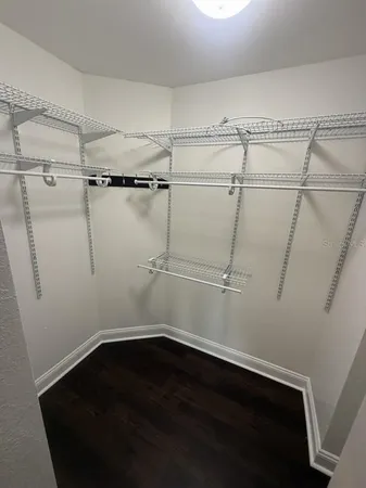 a view of a room with racks on the wall