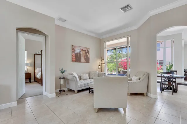 a view of walk in closet with clothes