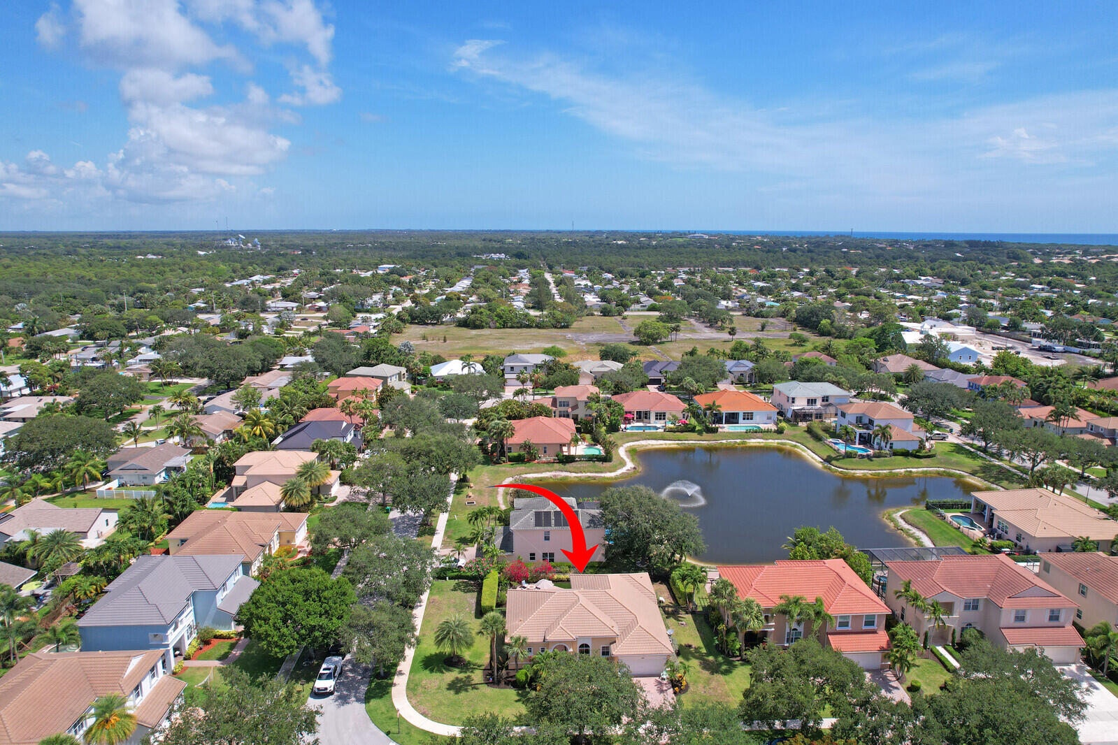 146 Magnolia Way Tequesta, FL 33469 - Photo 67 of 81 an aerial view of a city with lots of residential buildings ocean and mountain view in back