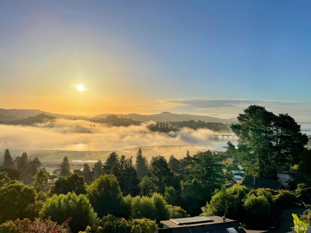 a view of lake and mountain
