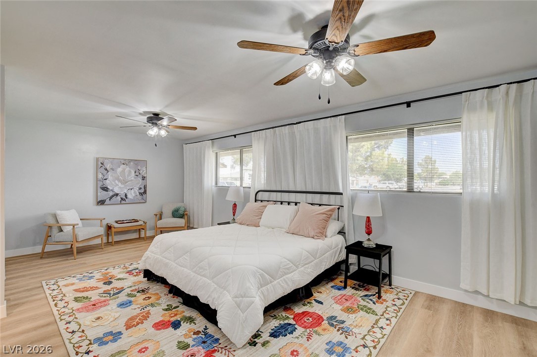 3765 Berkeley Street Logandale, NV 89021 - Photo 38 of 87 This spacious bedroom features ample natural light and comfortable flooring for peaceful repose.
