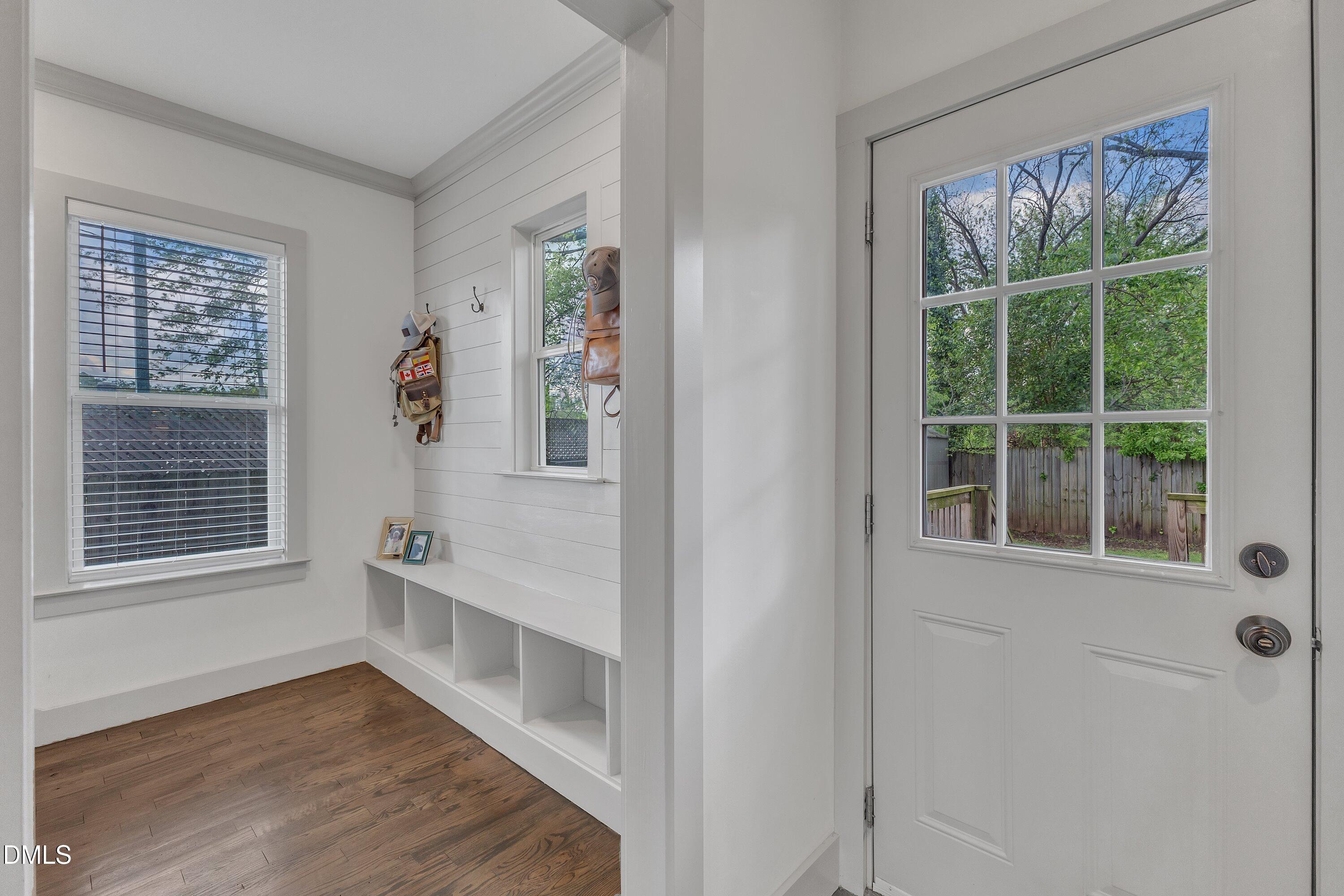 3 Maple Street Raleigh, NC 27610 - Photo 21 of 39 a view of an empty room with a window and wooden floor