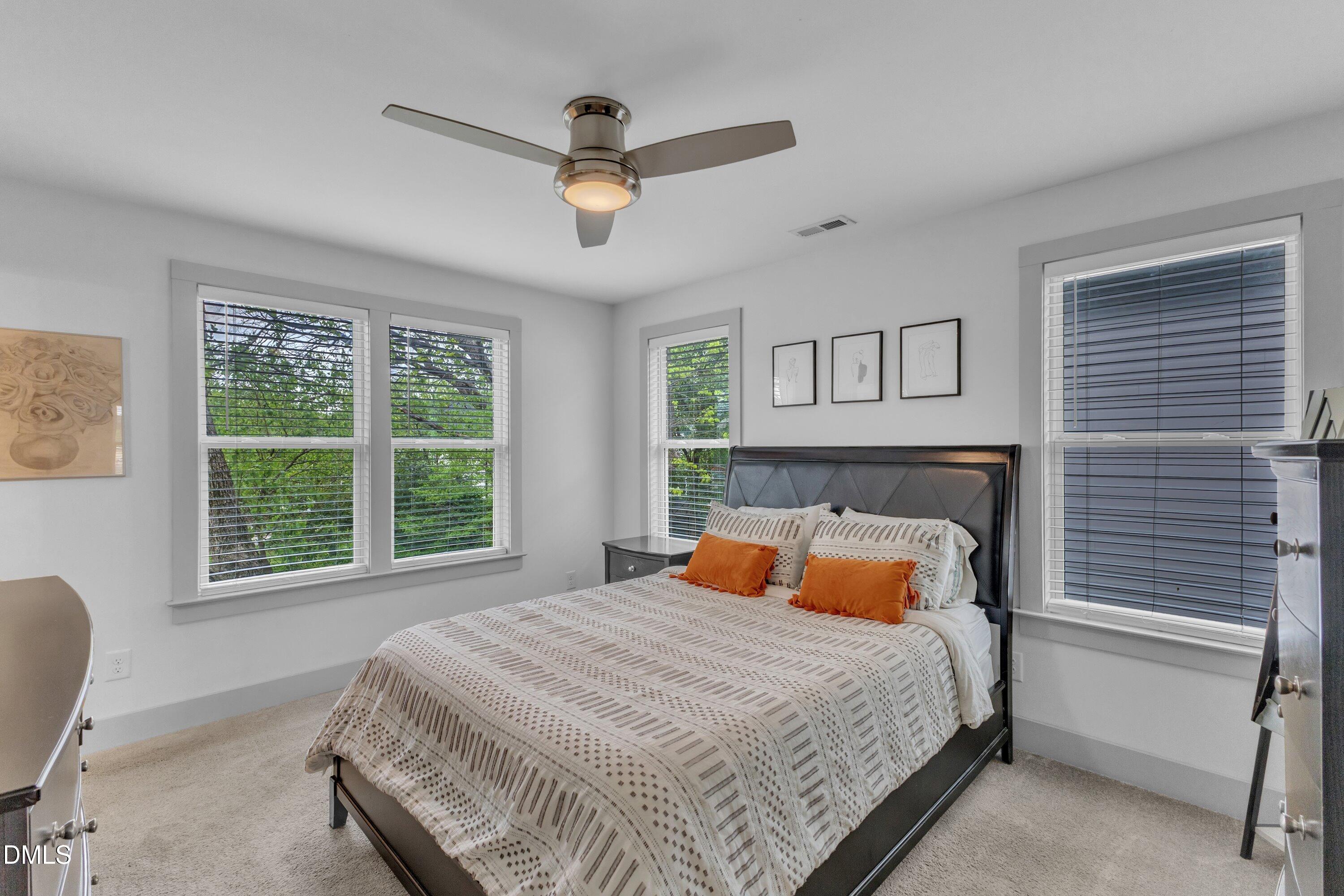 3 Maple Street Raleigh, NC 27610 - Photo 28 of 39 a bedroom with a bed and window