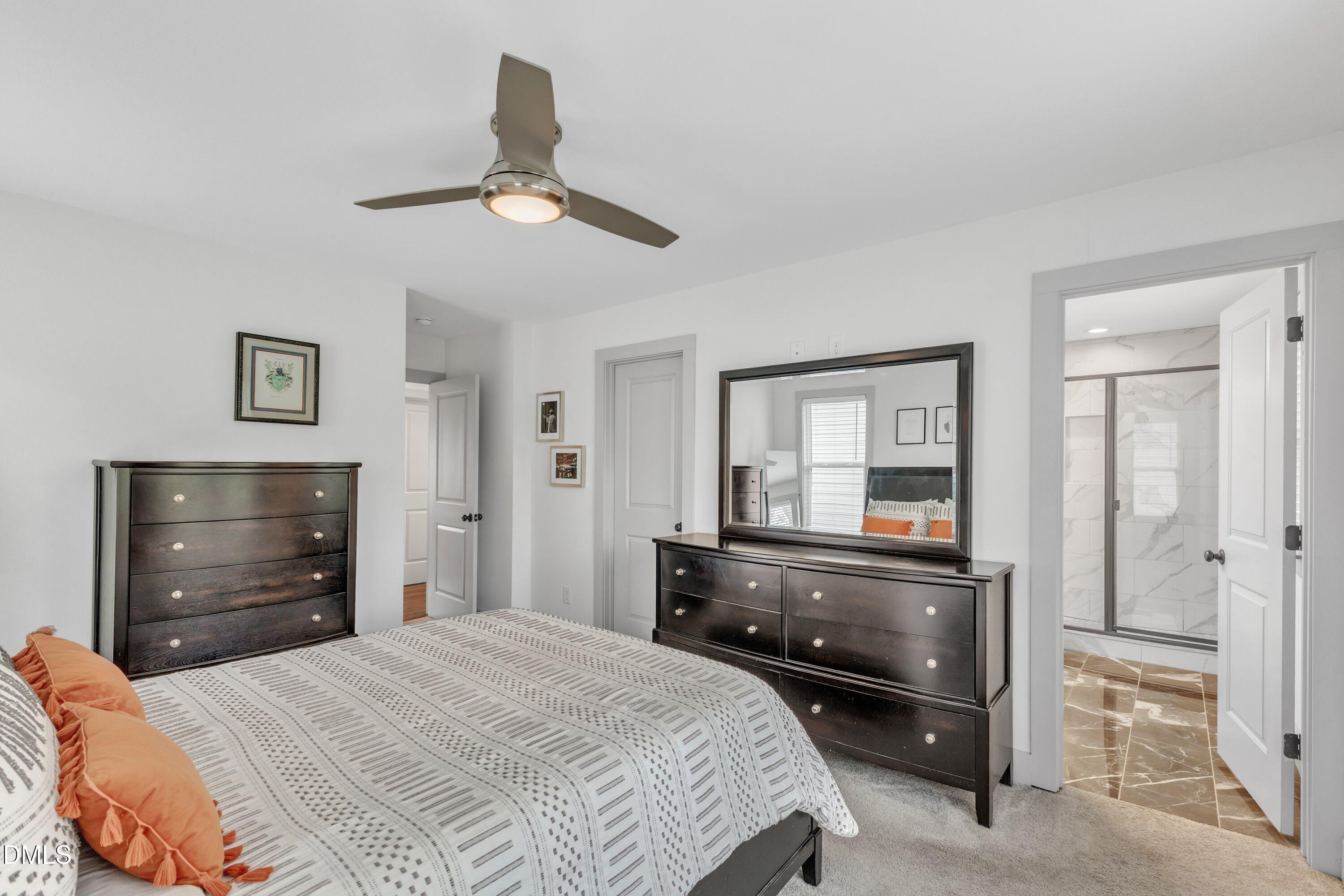 3 Maple Street Raleigh, NC 27610 - Photo 30 of 39 a bedroom with a bed and a dresser