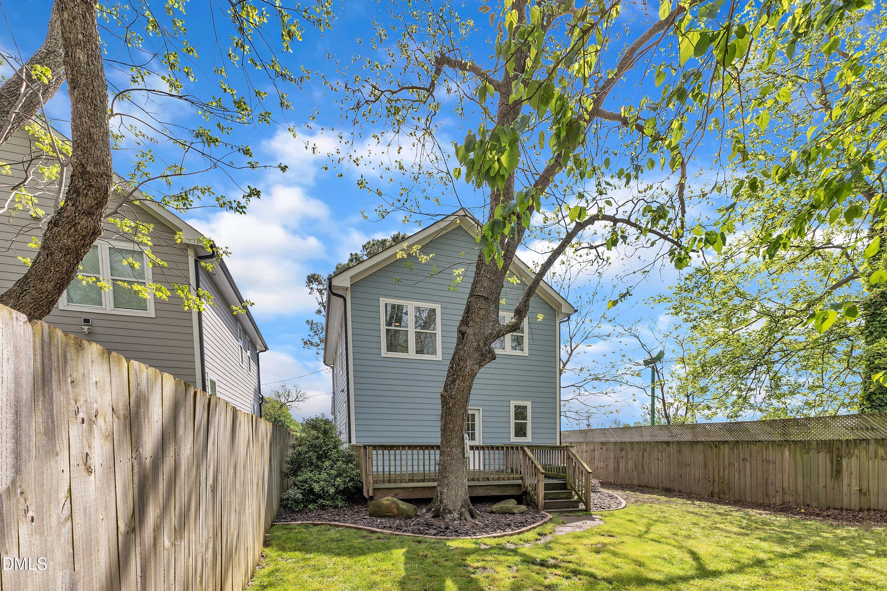3 Maple Street Raleigh, NC 27610 - Photo 36 of 39 a view of a house with a tree next to a yard