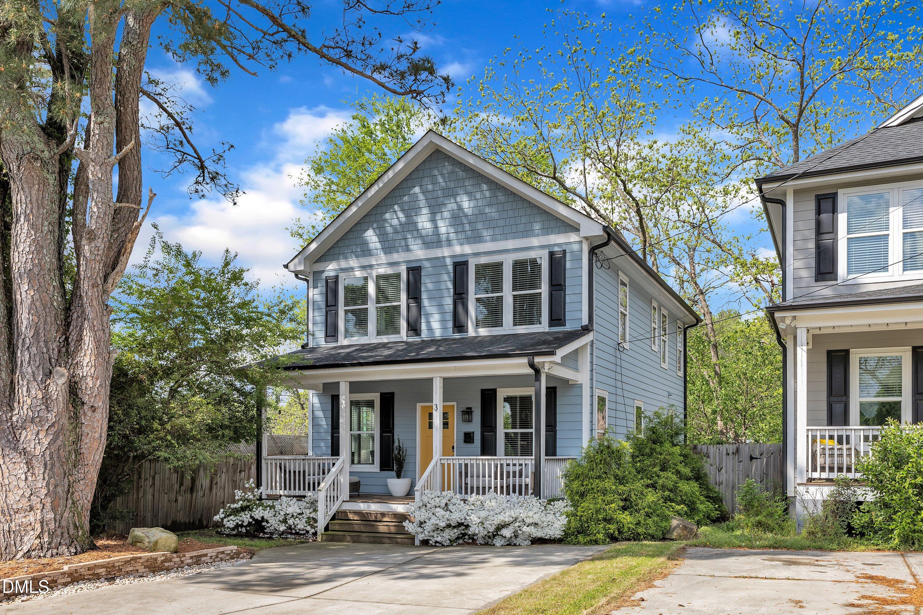 3 Maple Street Raleigh, NC 27610 - Photo 3 of 39 a front view of a house with garden