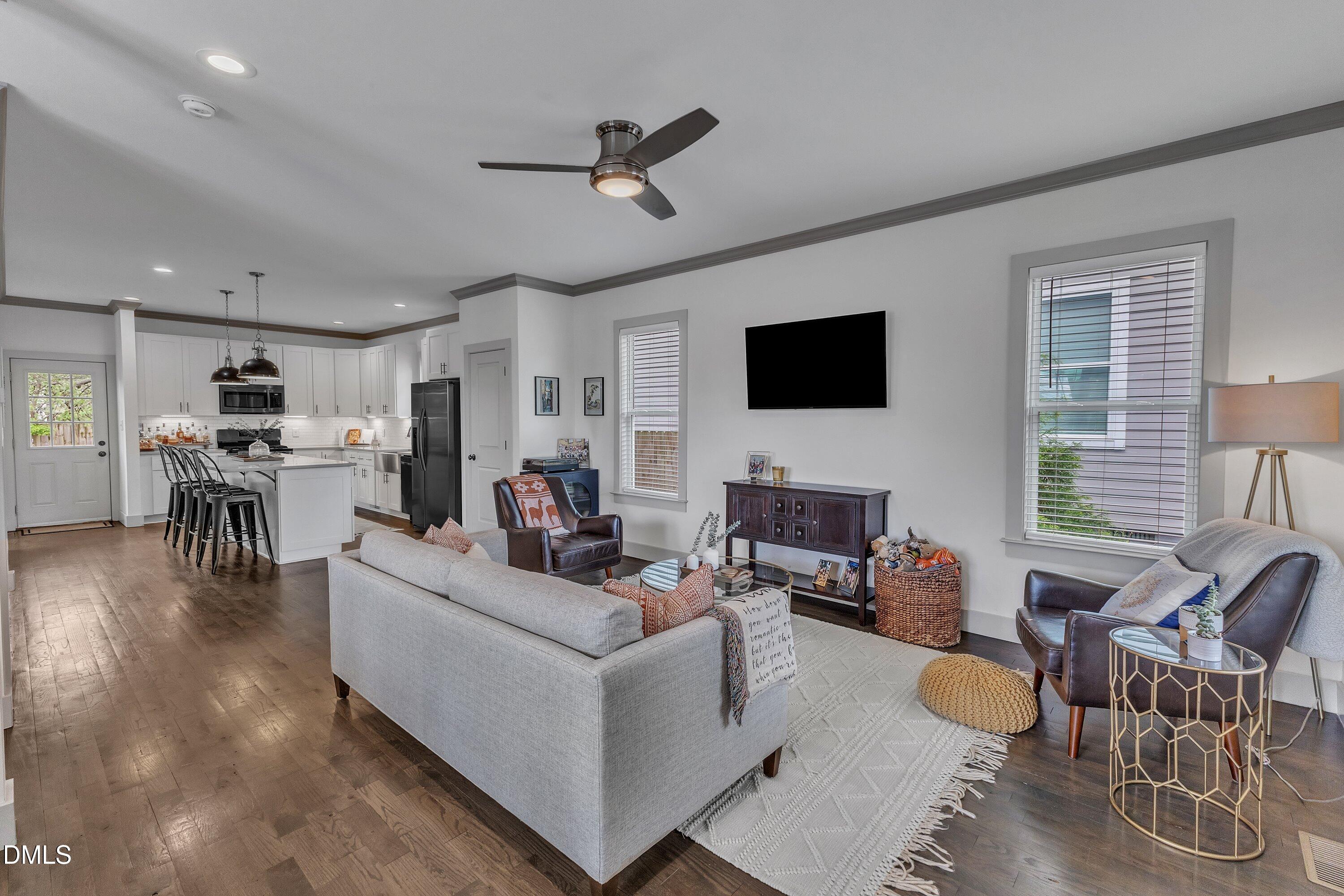 3 Maple Street Raleigh, NC 27610 - Photo 9 of 39 a living room with furniture and a flat screen tv
