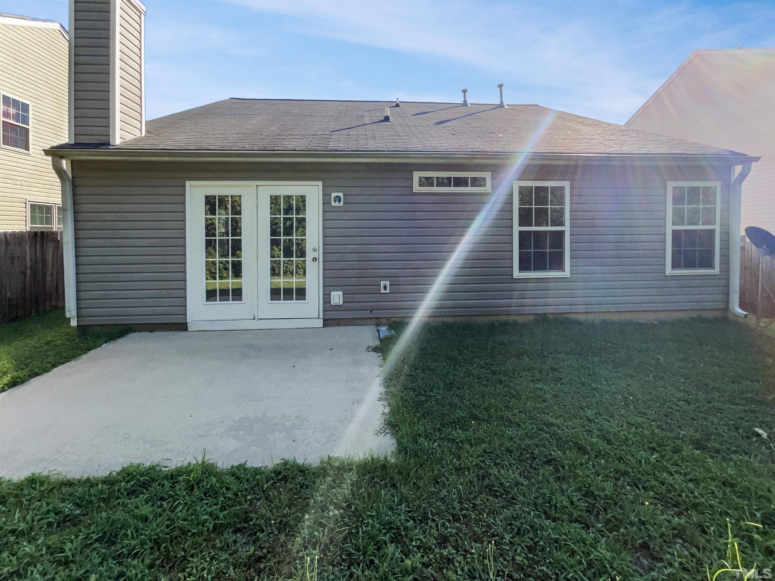 3300 Marcony Way Raleigh, NC 27610 - Photo 5 of 15 a front view of a house with a garden