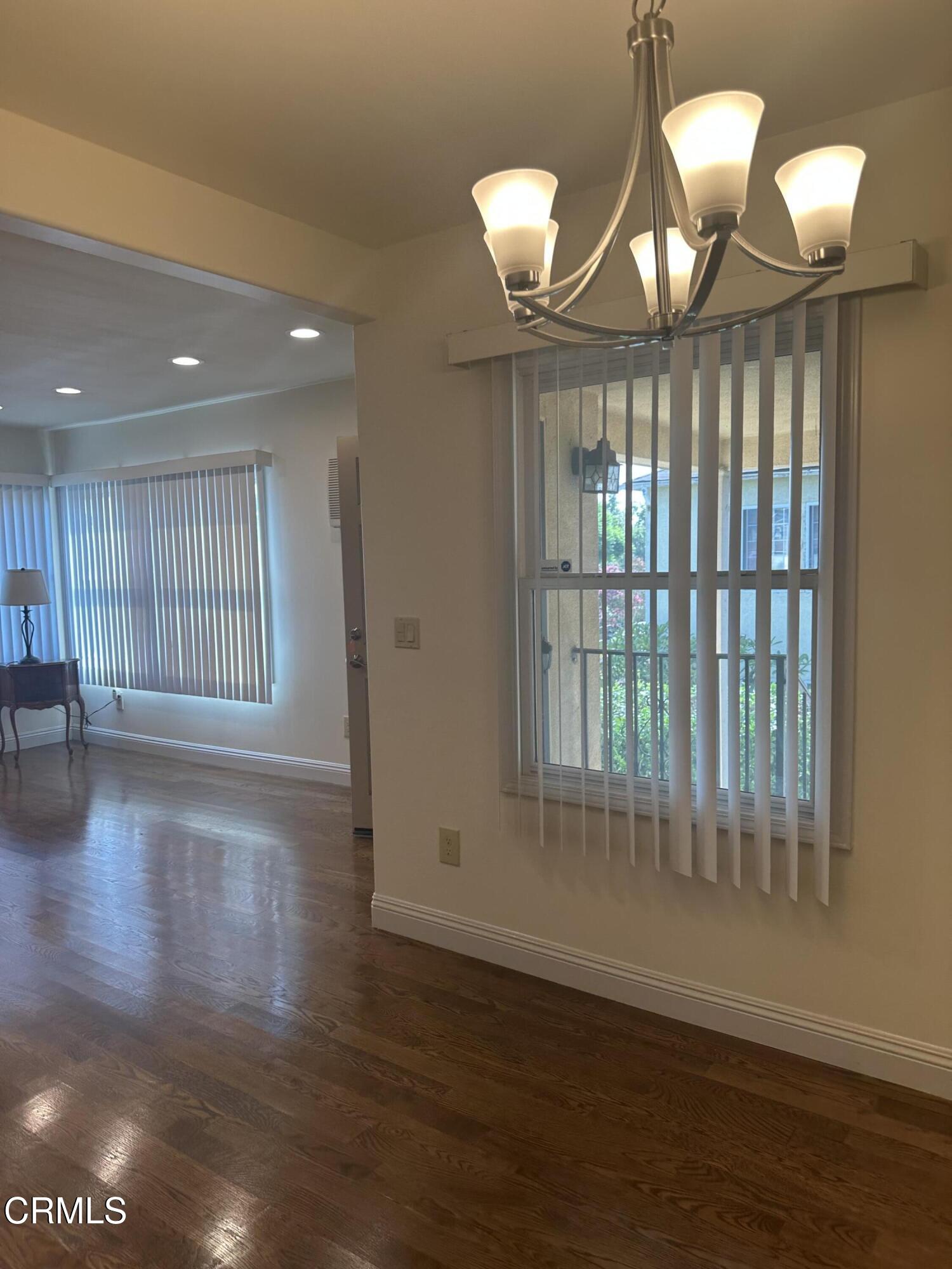 5255 1/2 Via Campo Street Los Angeles, CA 90022 - Photo 3 of 10 dining and living rm