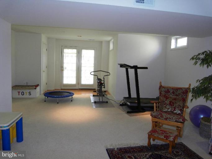 13339 Copper Ridge Road Germantown, MD 20874 - Photo 13 of 20 a view of a room with gym equipment
