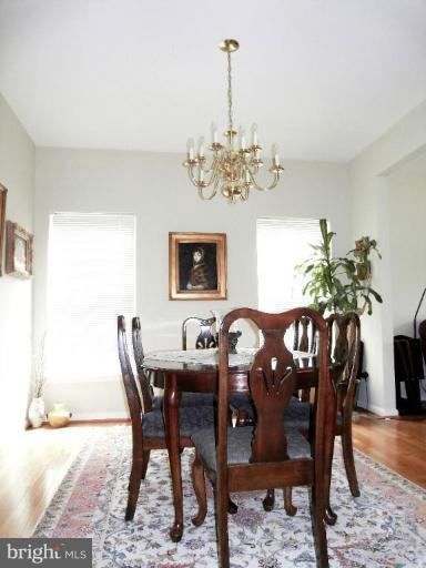 13339 Copper Ridge Road Germantown, MD 20874 - Photo 14 of 20 a view of a dining room with furniture