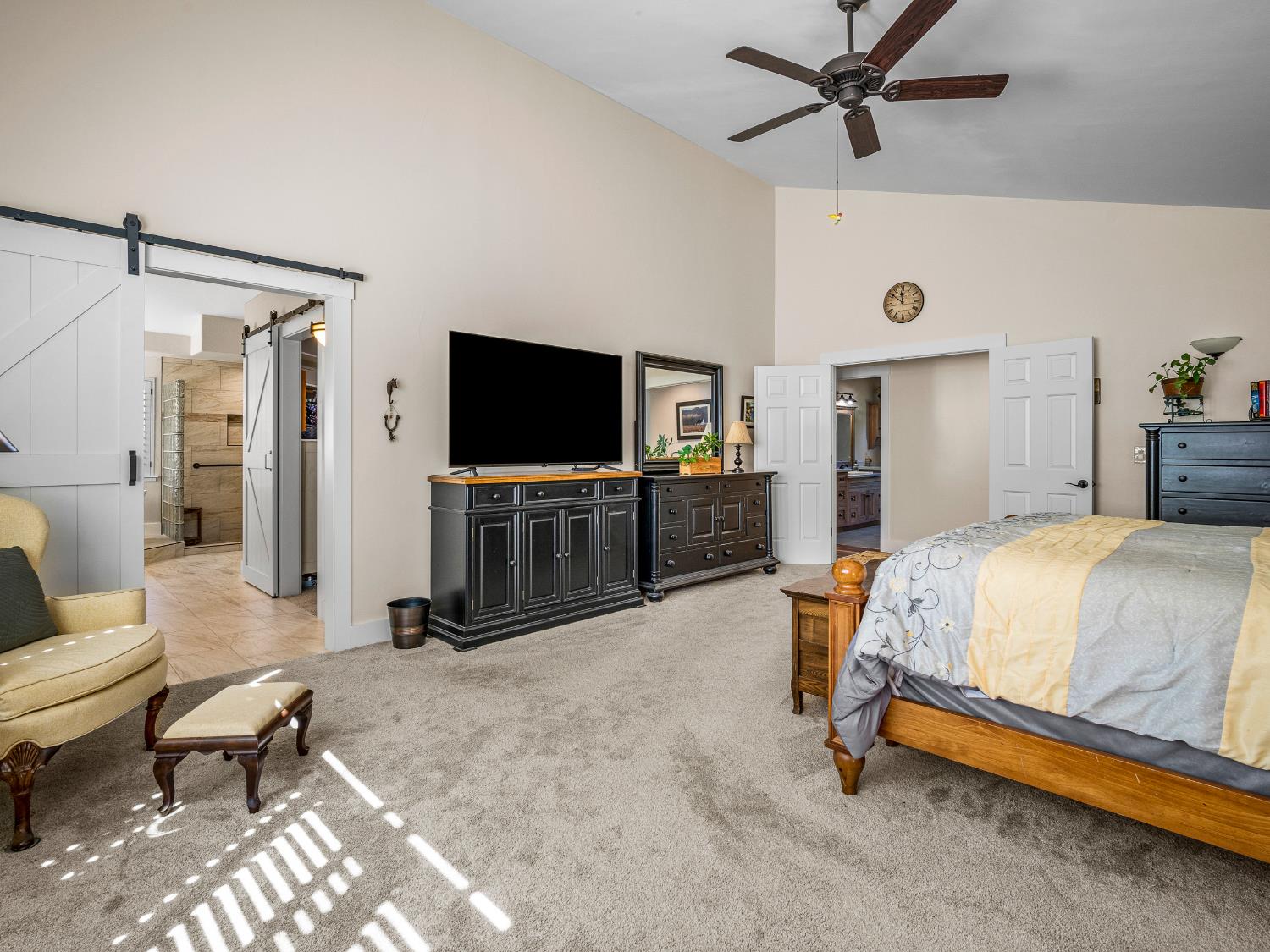 4032 Vega Loop Shingle Springs, CA 95682 - Photo 22 of 44 a bed room with a bed and a flat screen tv