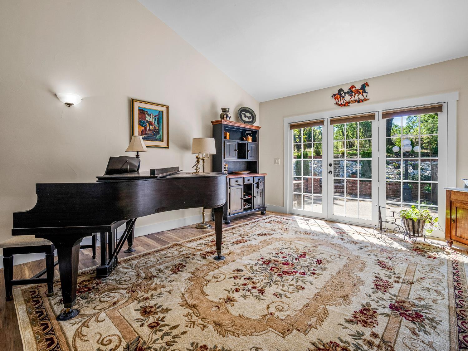 4032 Vega Loop Shingle Springs, CA 95682 - Photo 4 of 44 a view of a workspace with furniture