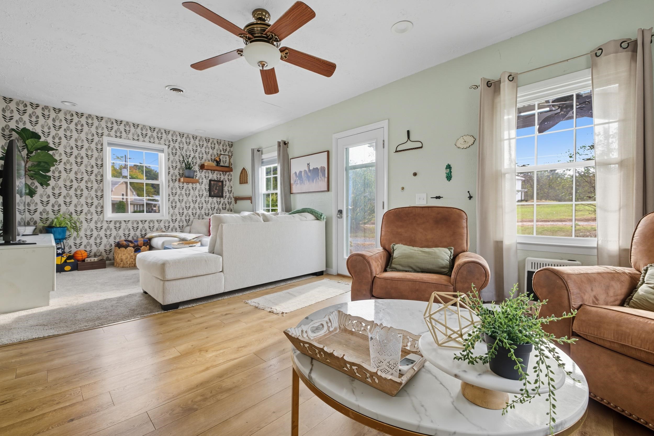 8449 Indian Trail Road Harrisonburg, VA 22802 - Photo 11 of 75 a living room with furniture and a large window