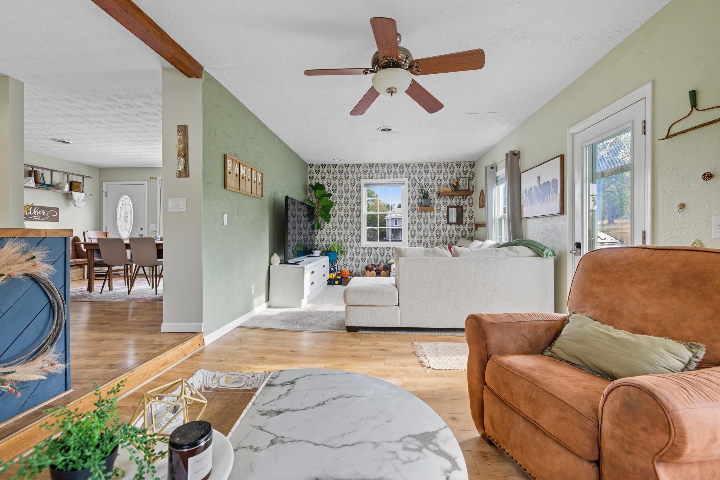 8449 Indian Trail Road Harrisonburg, VA 22802 - Photo 12 of 75 a living room with furniture and kitchen view